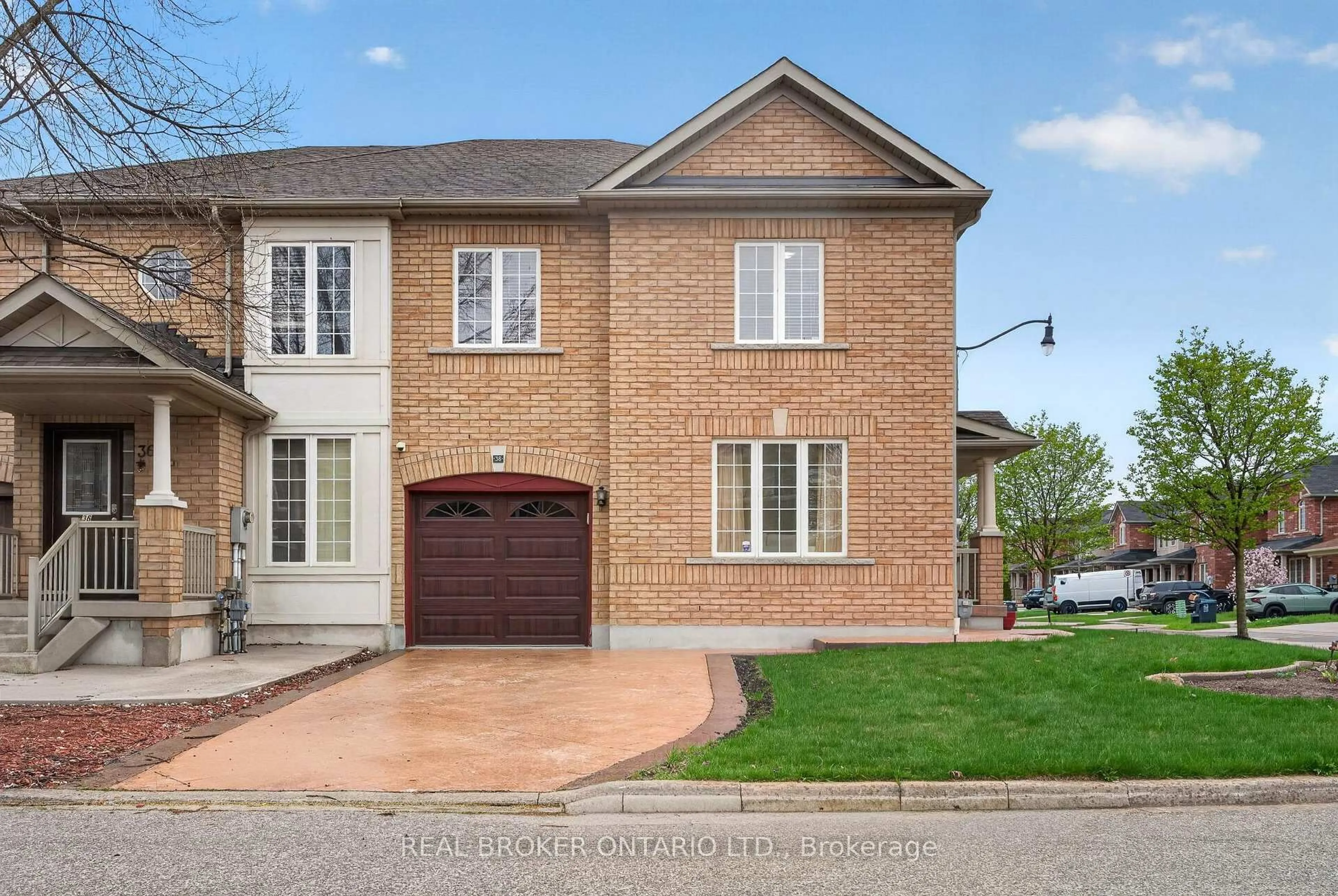 Home with brick exterior material, street for 38 Nutwood Way, Brampton Ontario L6R 0X1