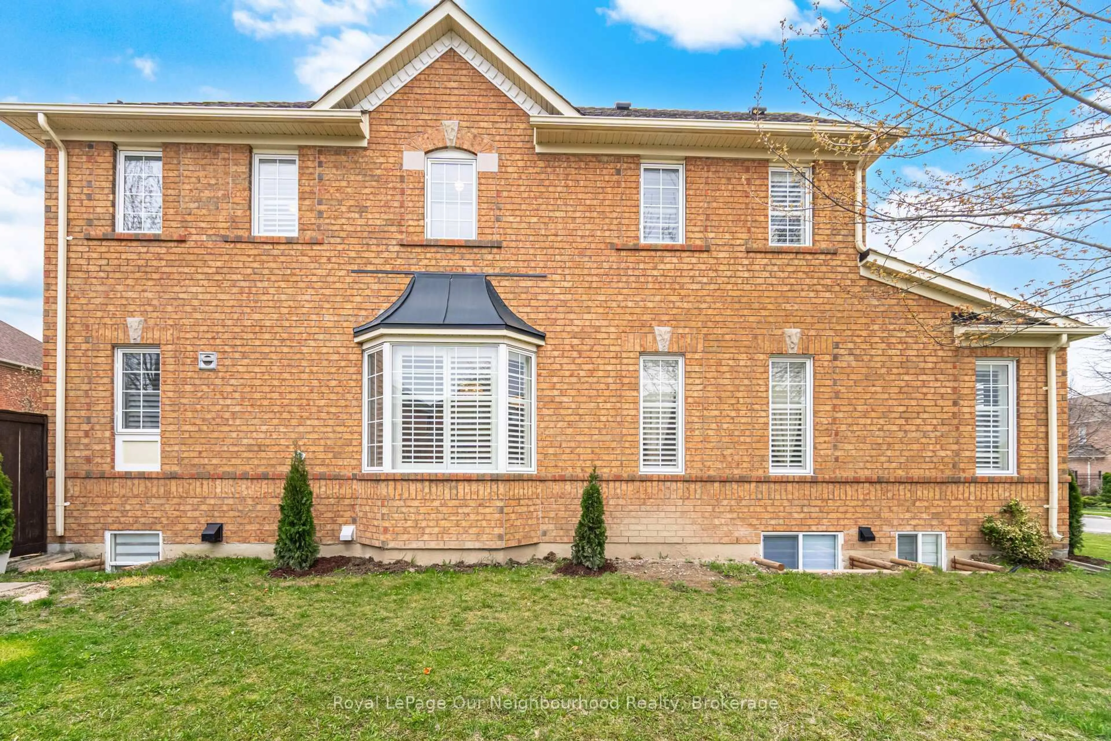 Home with brick exterior material, street for 69 Bloomsbury Ave, Brampton Ontario L6P 1S6