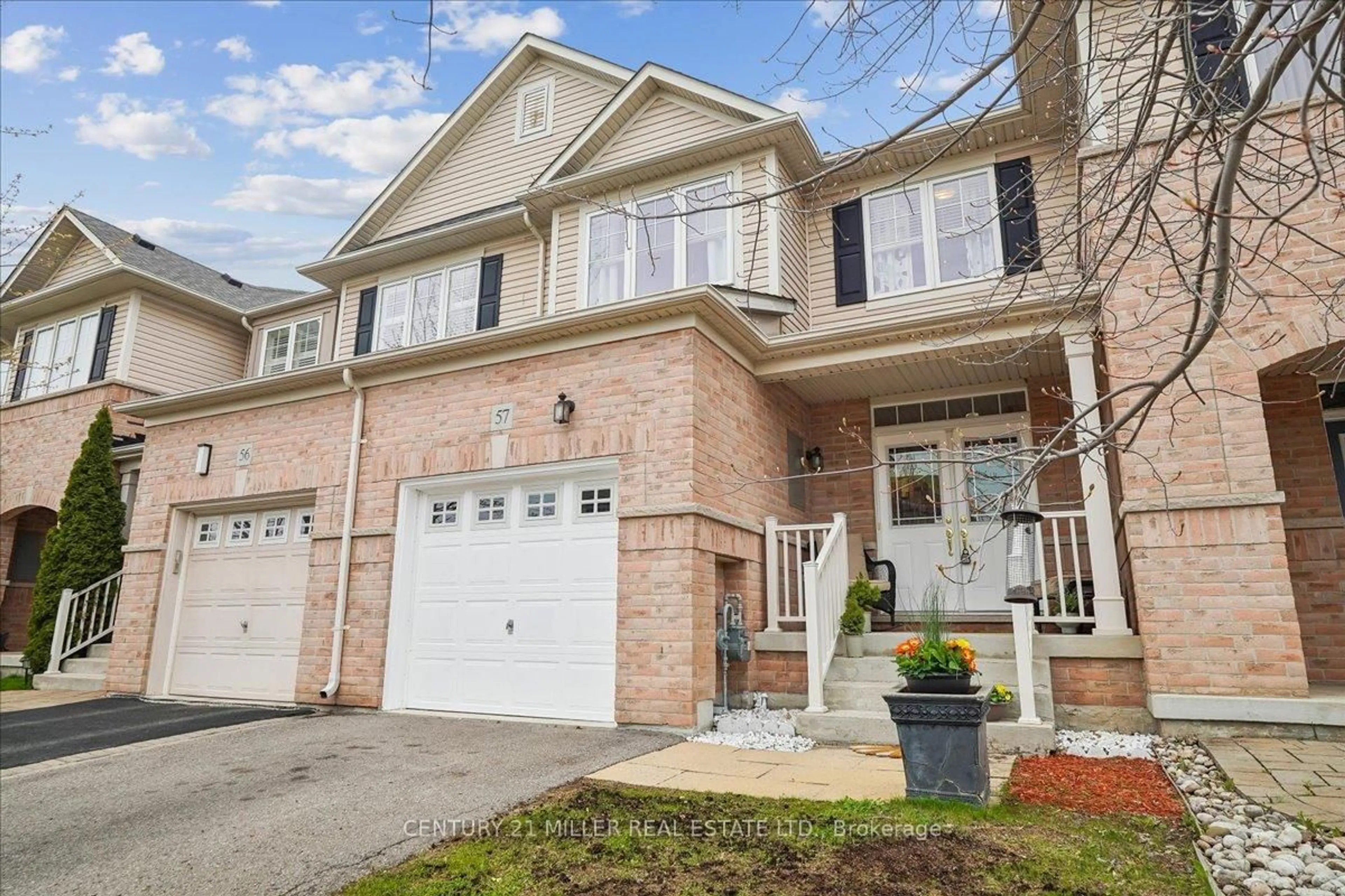 Home with brick exterior material, street for 2019 Trawden Way #57, Oakville Ontario L6M 0M2