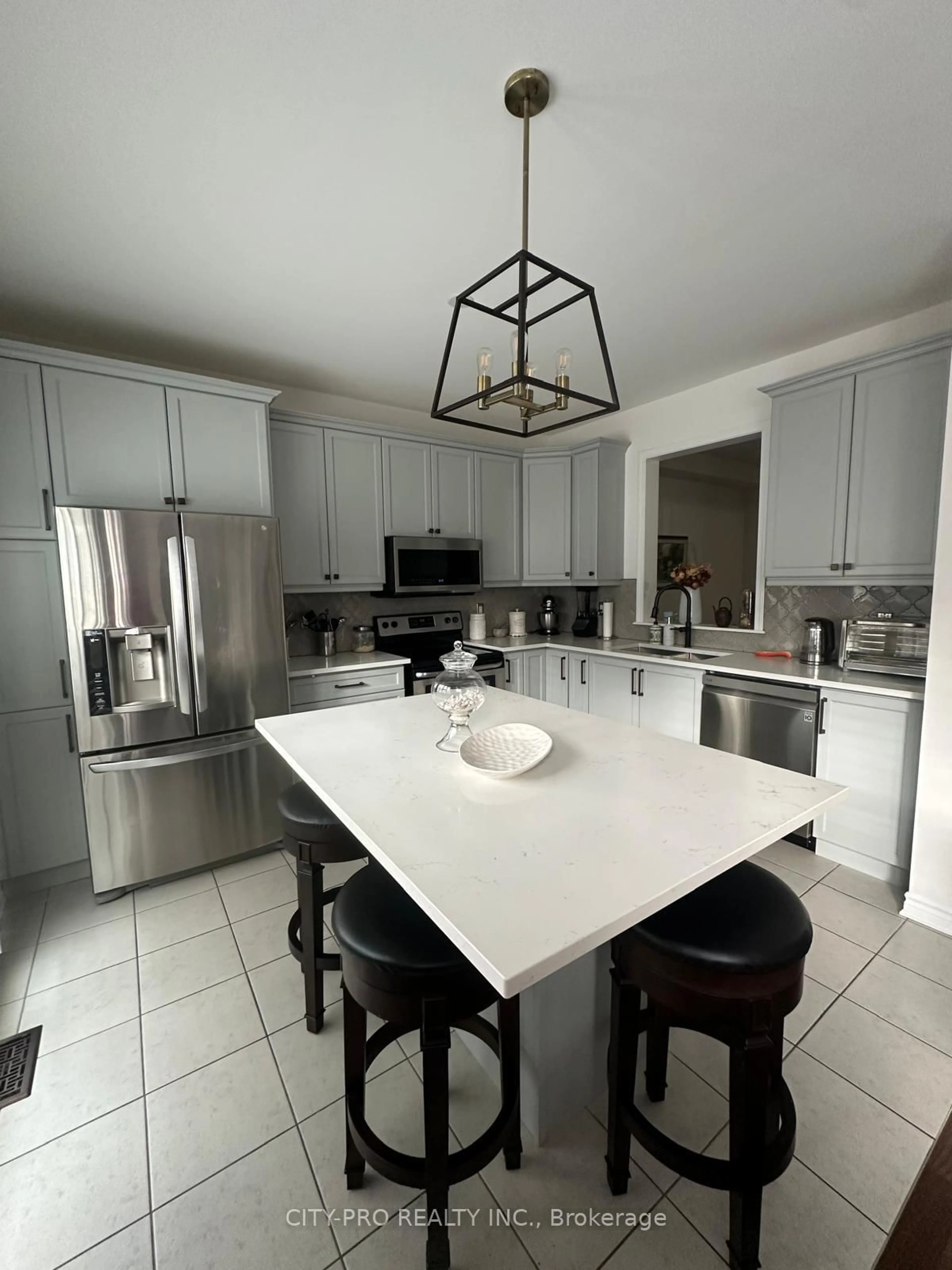 Open concept kitchen, ceramic/tile floor for 439 Etheridge Ave, Milton Ontario L9E 0B3