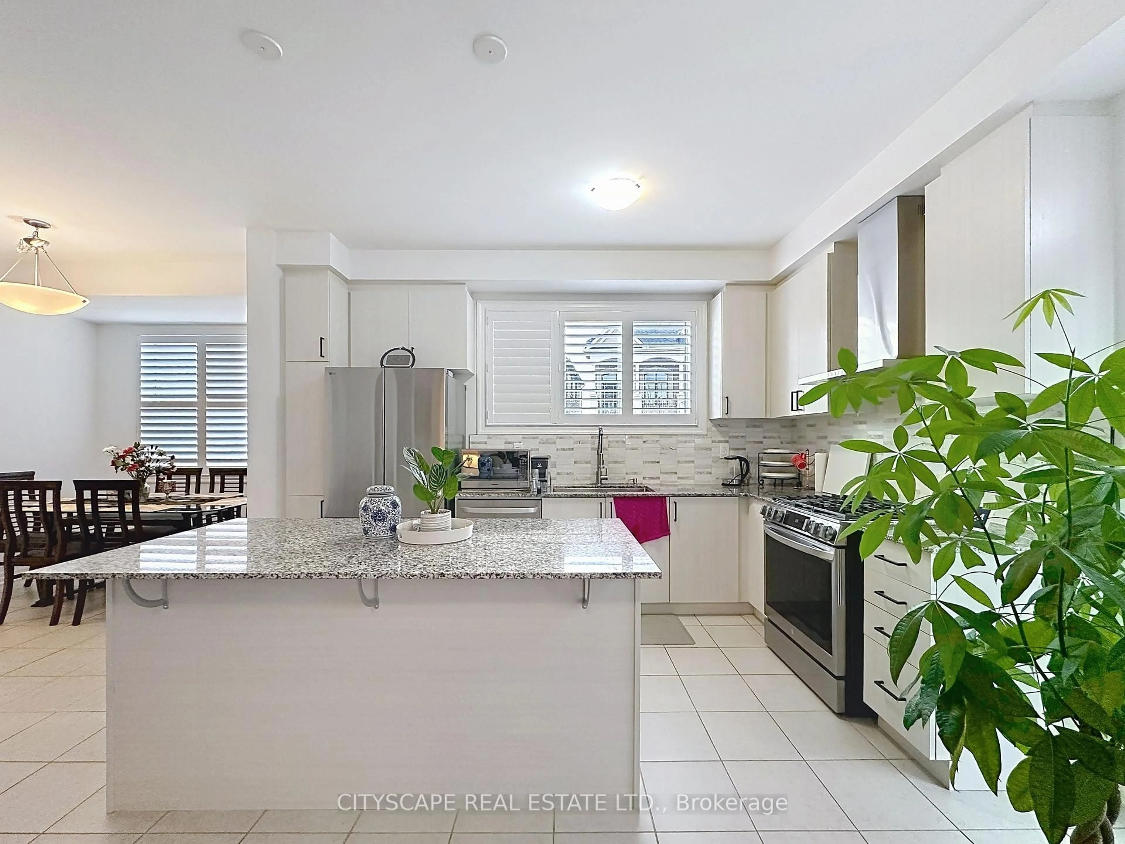 Open concept kitchen, ceramic/tile floor for 1790 Dance Crt, Milton Ontario L9E 2A2