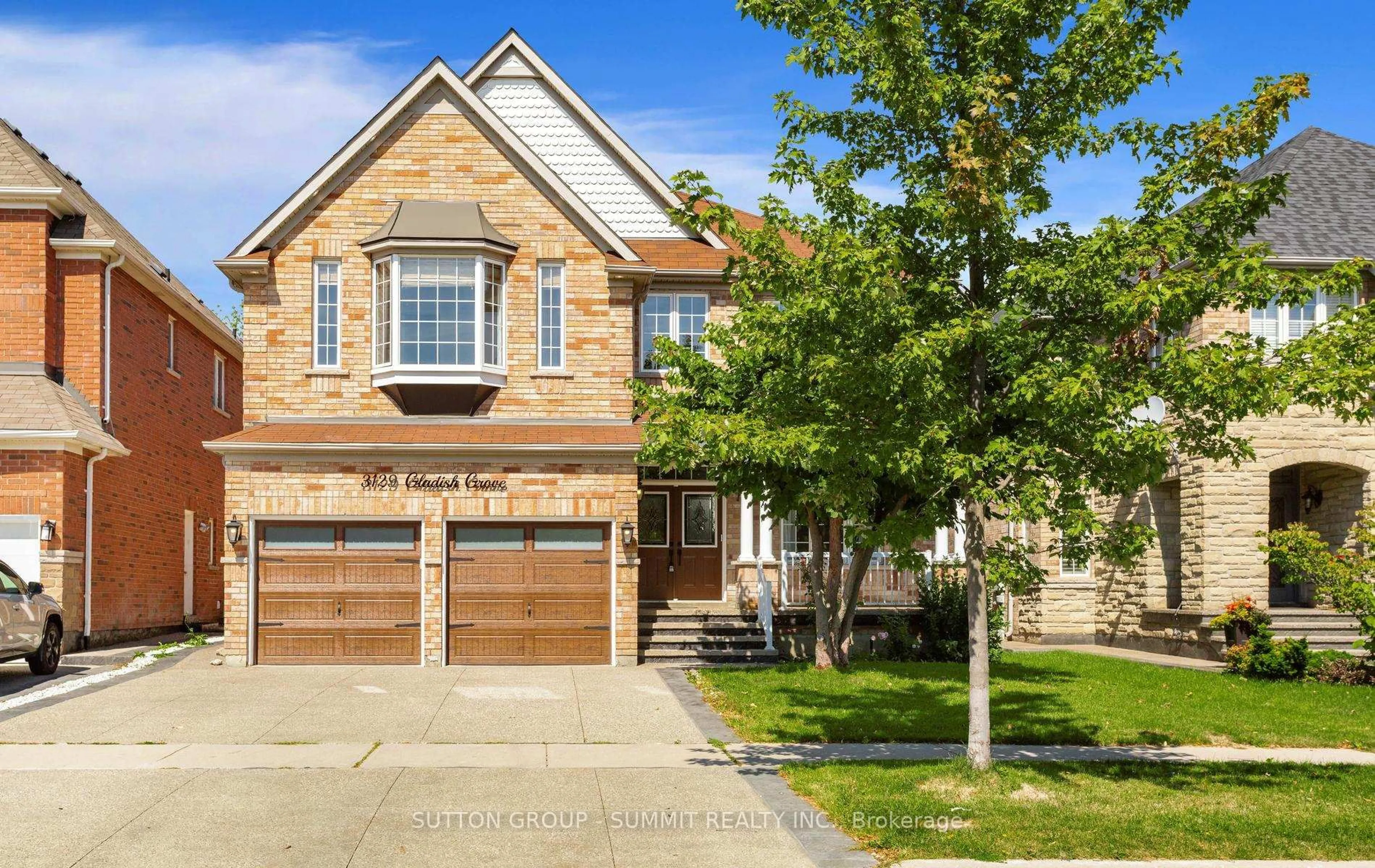 Home with brick exterior material, street for 3129 Gladish Grve, Mississauga Ontario L5M 0C3