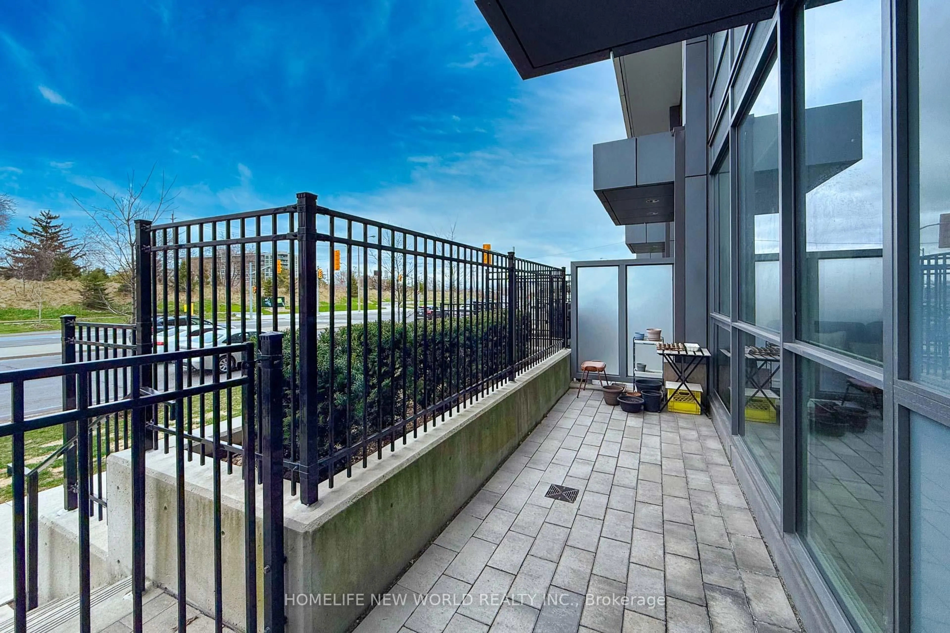 Patio, city buildings view from balcony for 10 De Boers Dr #TH04, Toronto Ontario M3J 0L6