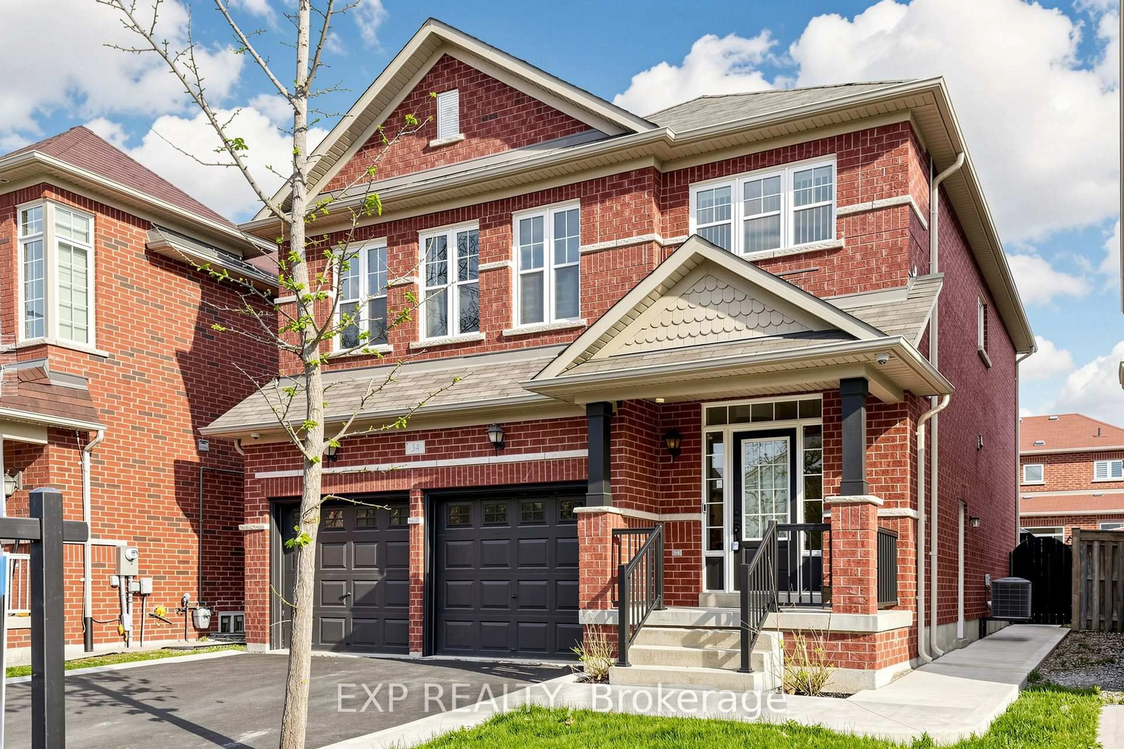 Home with brick exterior material, street for 34 Freesia Rd, Brampton Ontario L7A 0N1