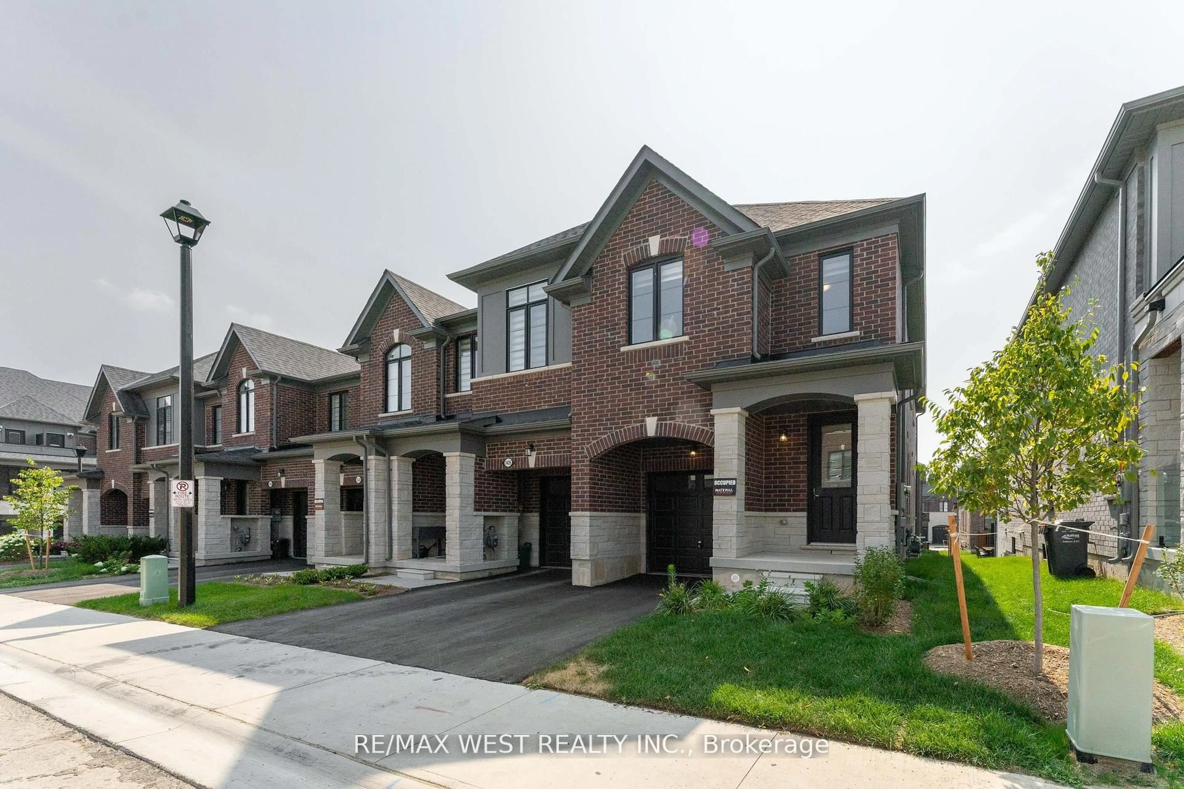 Home with brick exterior material, street for 1424 National Common, Burlington Ontario L7P 0V7
