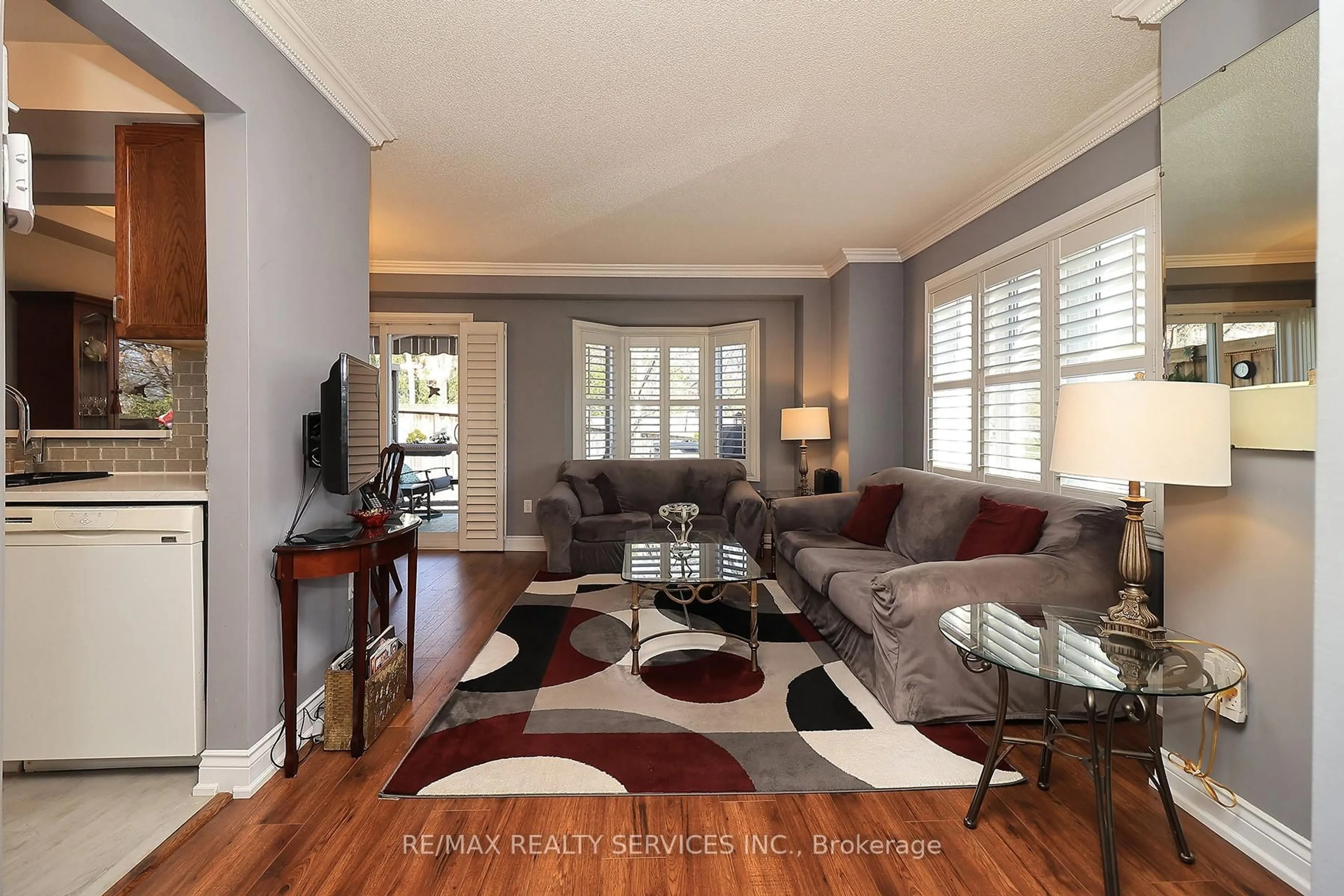 Living room with furniture, wood/laminate floor for 2088 Leanne Blvd #15, Mississauga Ontario L5K 2S7