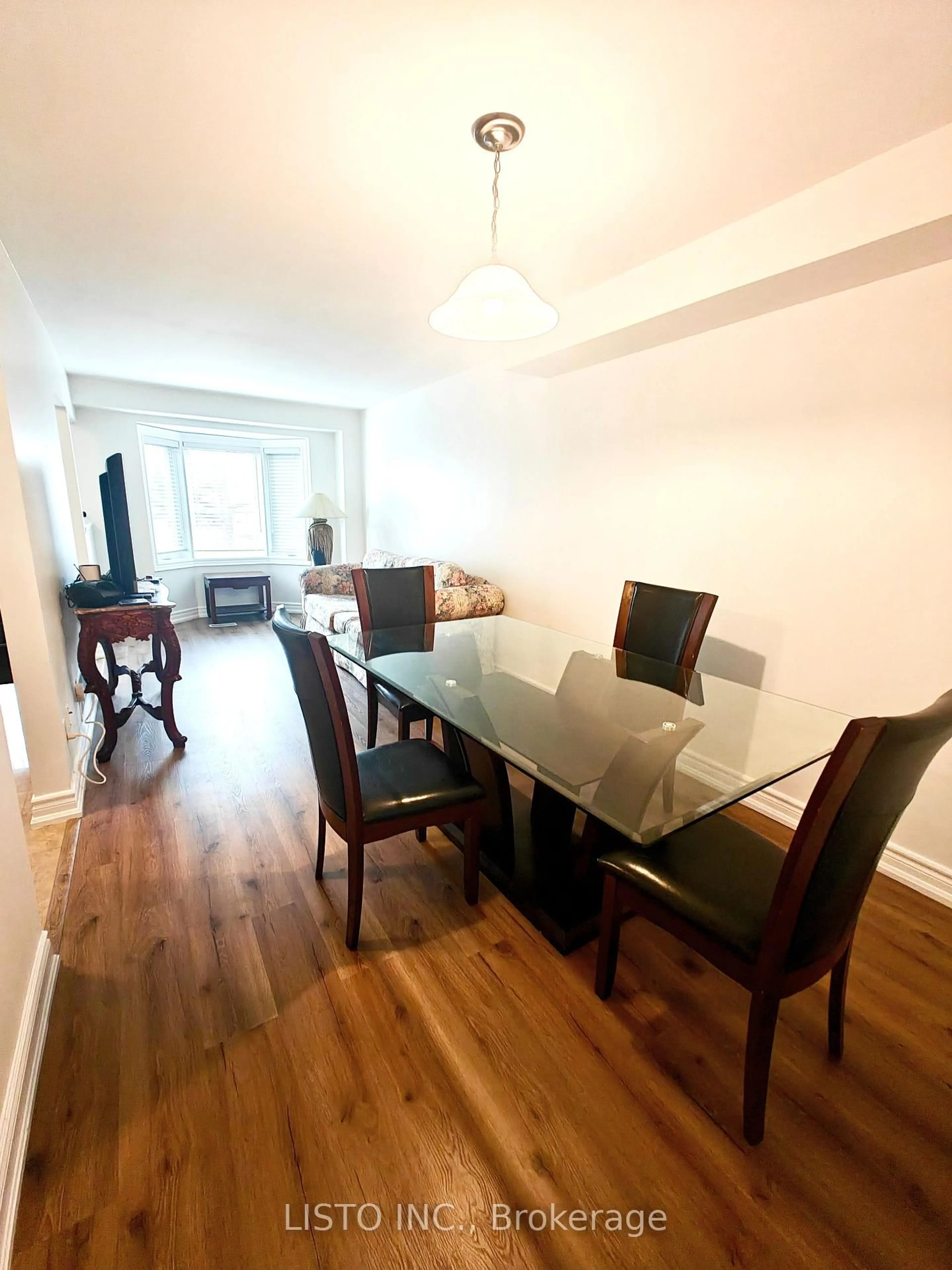 Dining room, wood/laminate floor for 5255 GUILDWOOD Way #103, Mississauga Ontario L5R 4A9