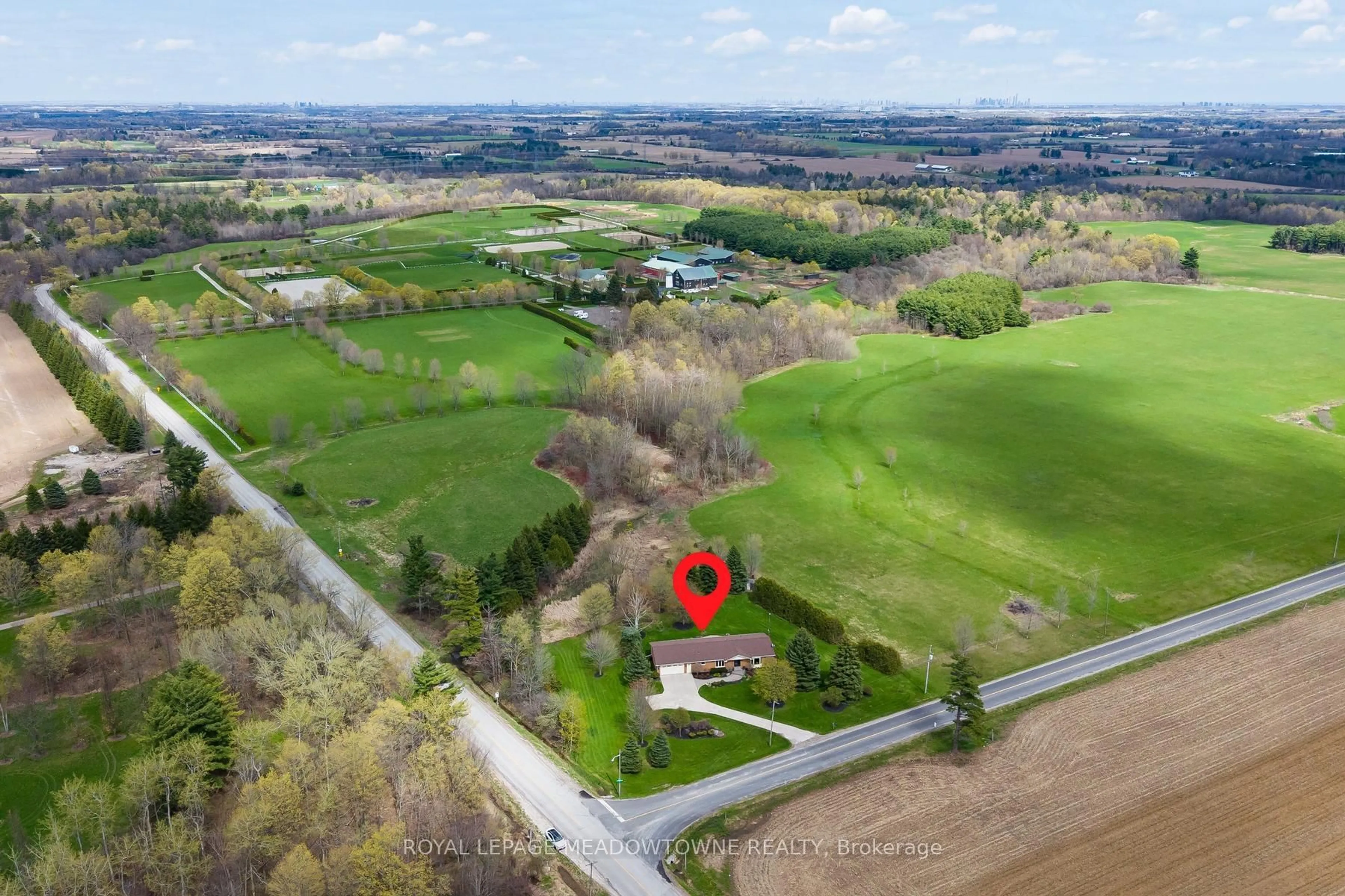 A pic from outside/outdoor area/front of a property/back of a property/a pic from drone, unknown for 10997 Third Line, Halton Hills Ontario L9T 2X9