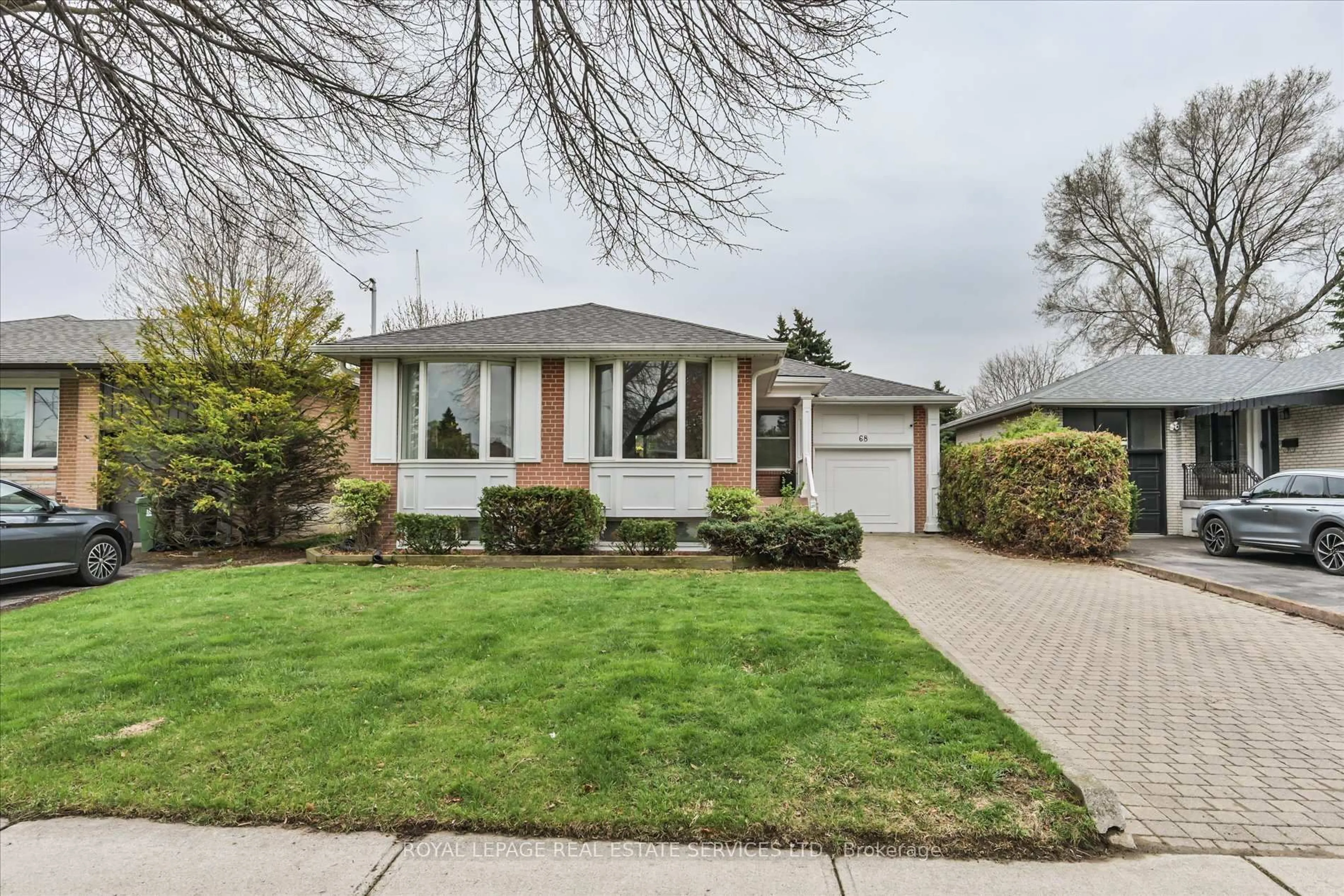 Home with brick exterior material, street for 68 Renault Cres, Toronto Ontario M9P 1J5