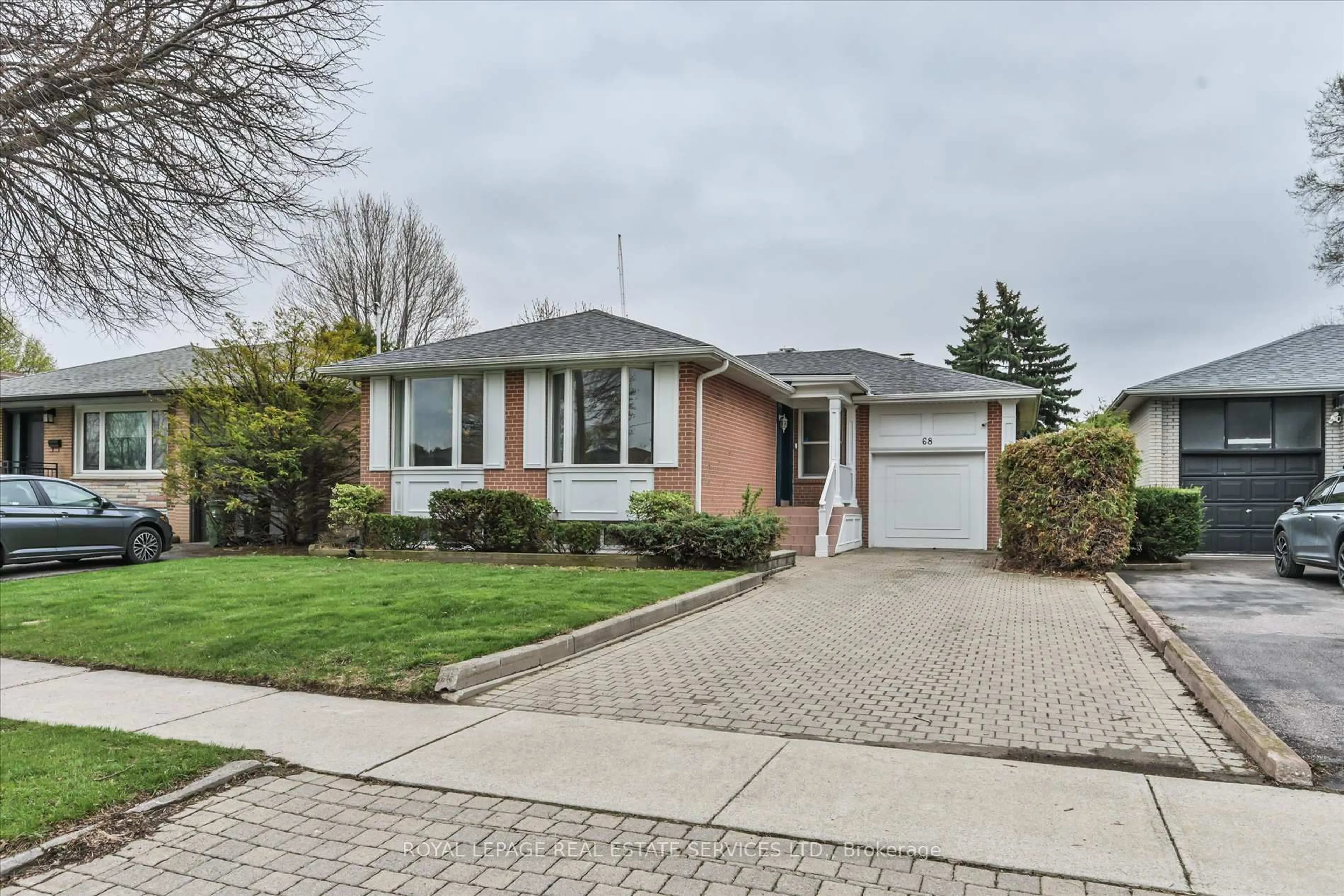 Home with brick exterior material, street for 68 Renault Cres, Toronto Ontario M9P 1J5
