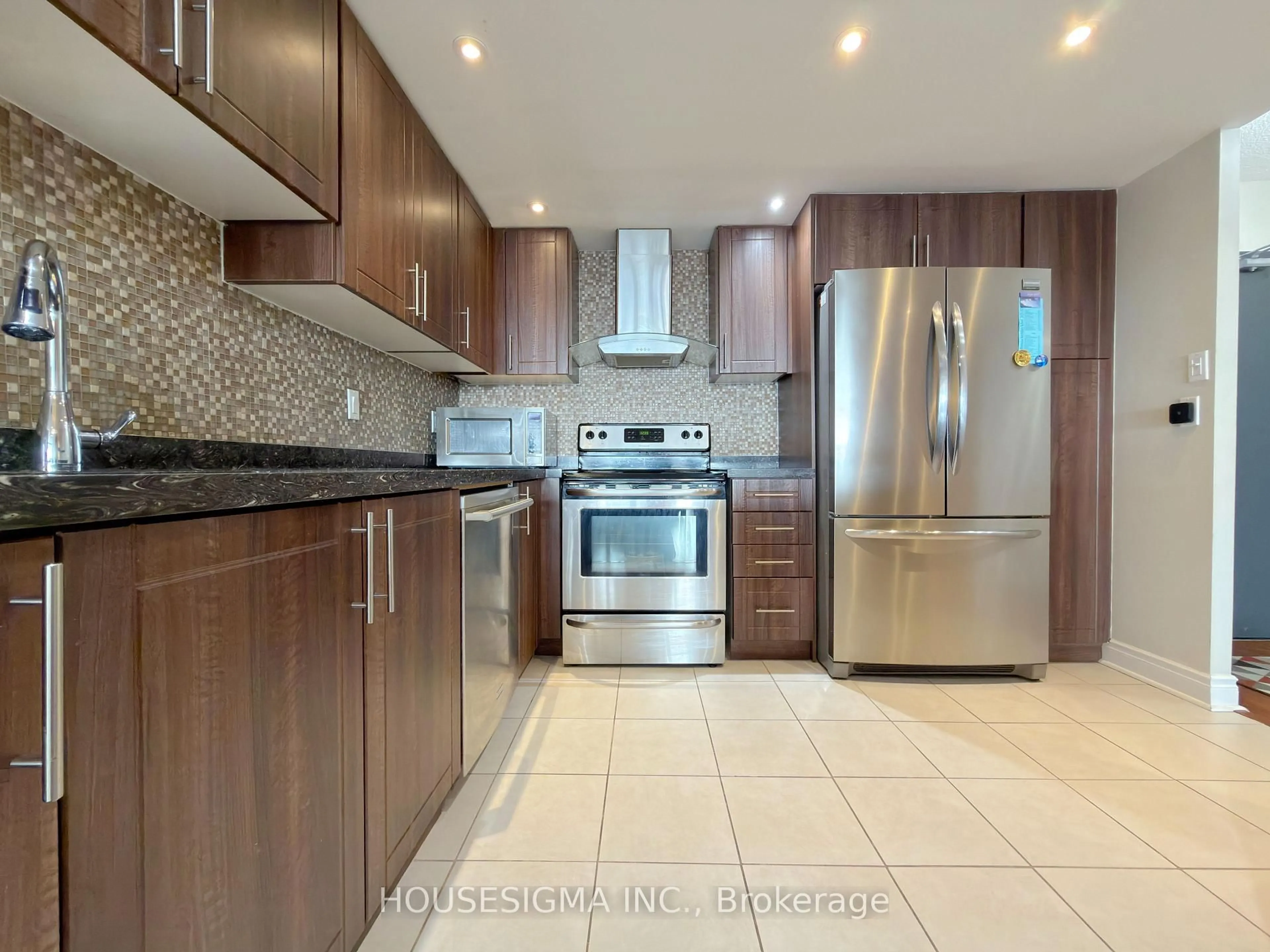 Open concept kitchen, ceramic/tile floor for 8 Lisa St #1103, Brampton Ontario L6T 4S6