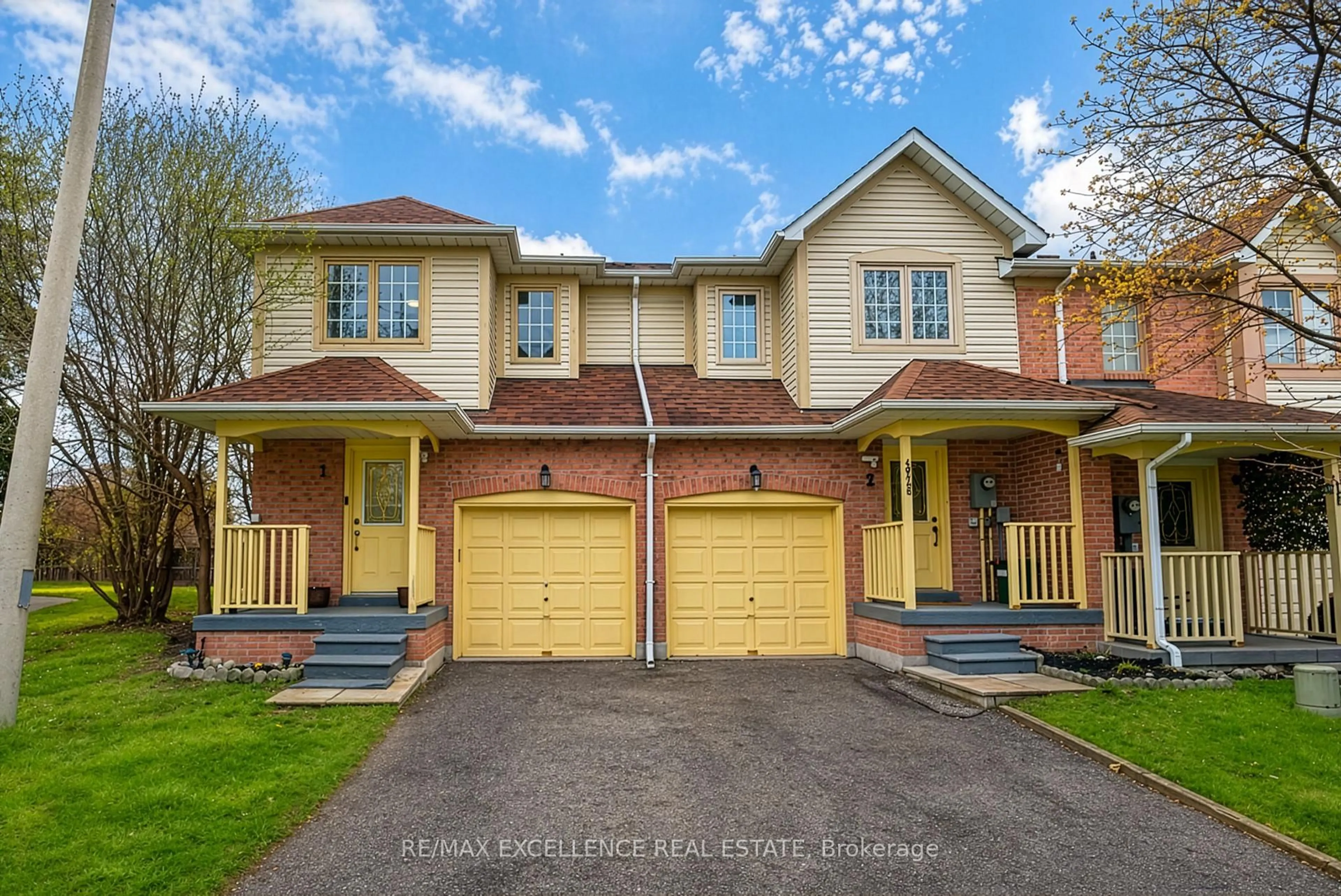 Home with brick exterior material, street for 4920 Rathkeale Rd #1, Mississauga Ontario L5V 2E9