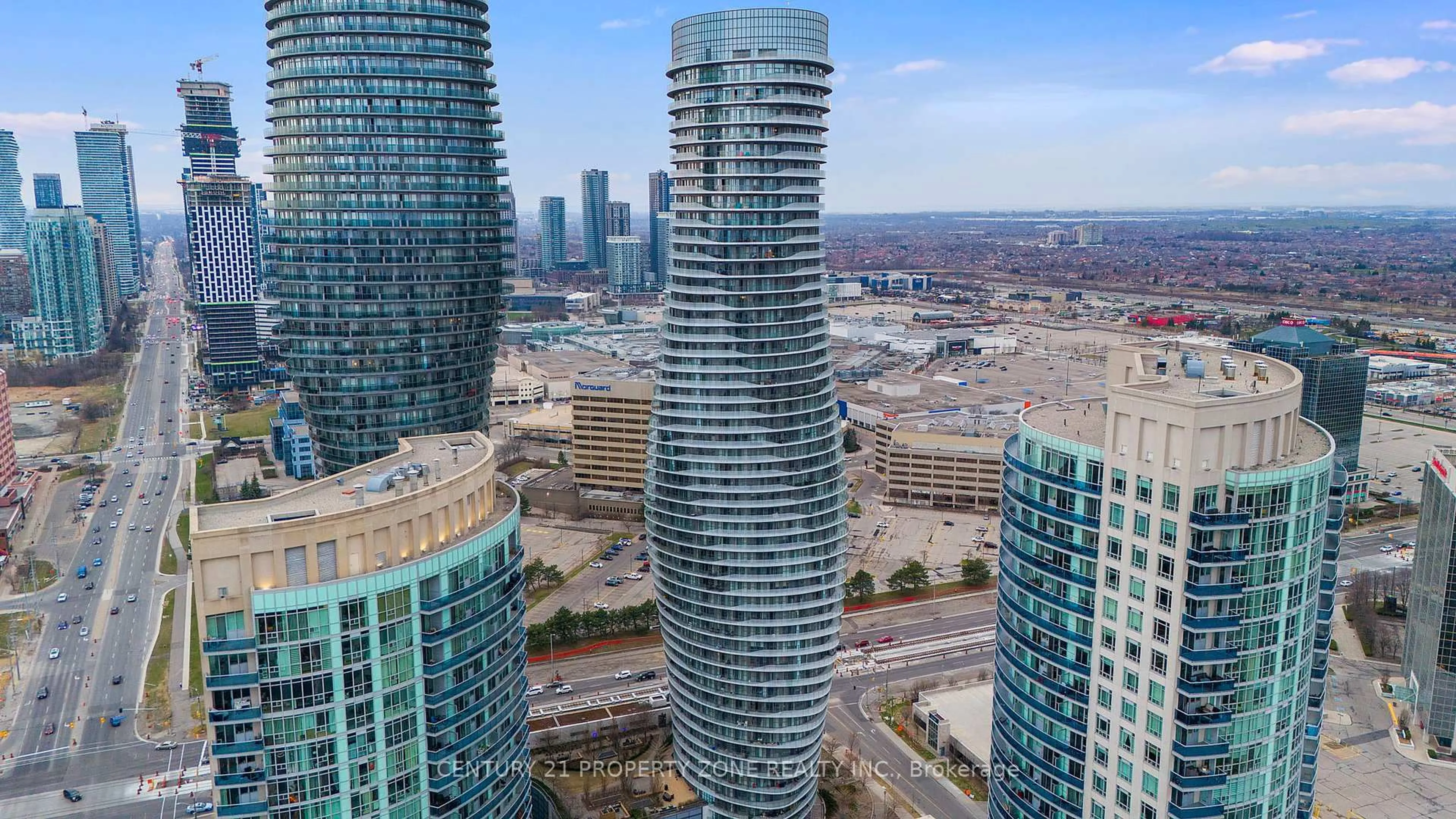 A pic from outside/outdoor area/front of a property/back of a property/a pic from drone, city buildings view from balcony for 50 Absolute Ave #1003, Mississauga Ontario L4Z 0A8