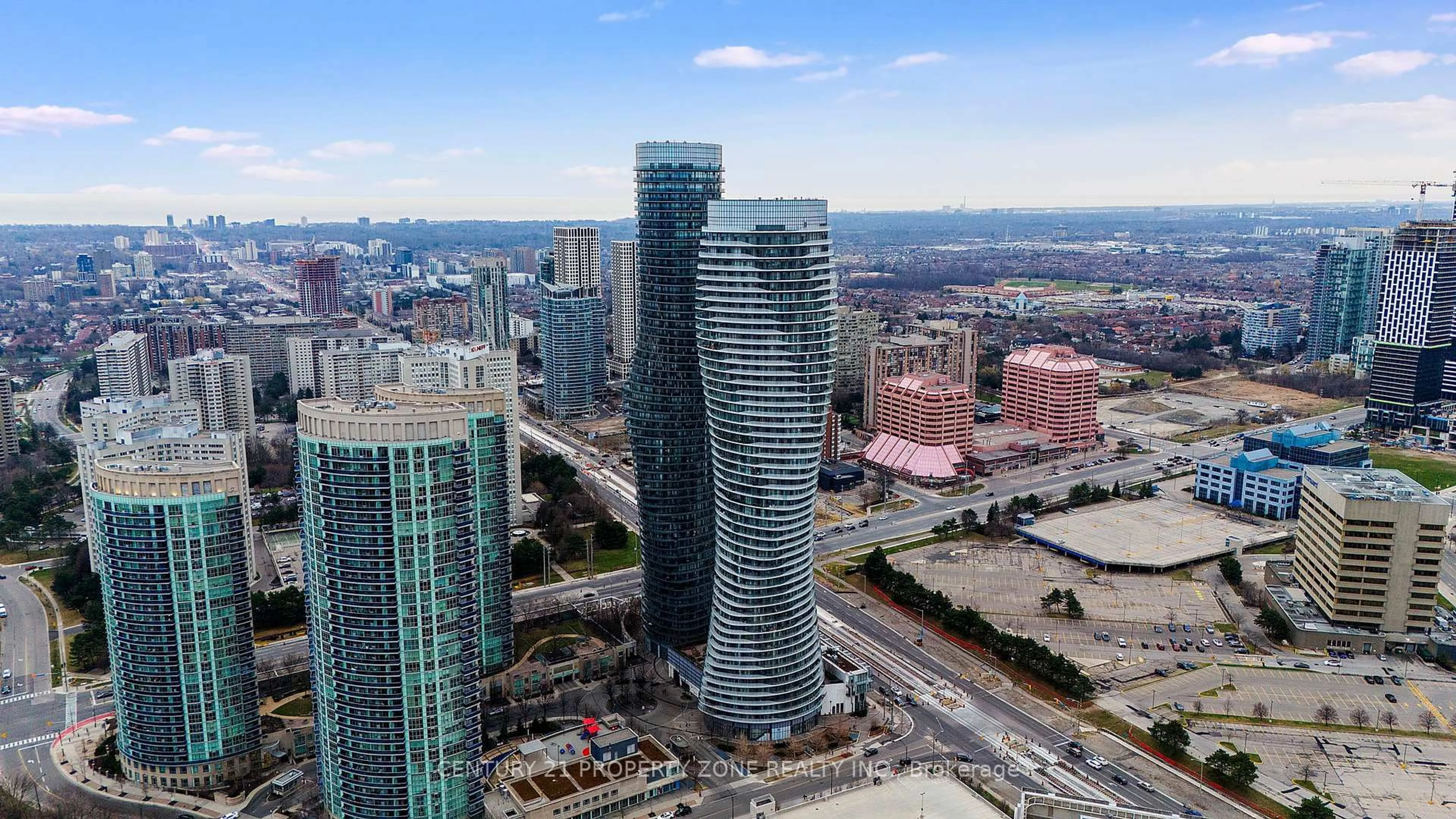 A pic from outside/outdoor area/front of a property/back of a property/a pic from drone, city buildings view from balcony for 50 Absolute Ave #1003, Mississauga Ontario L4Z 0A8