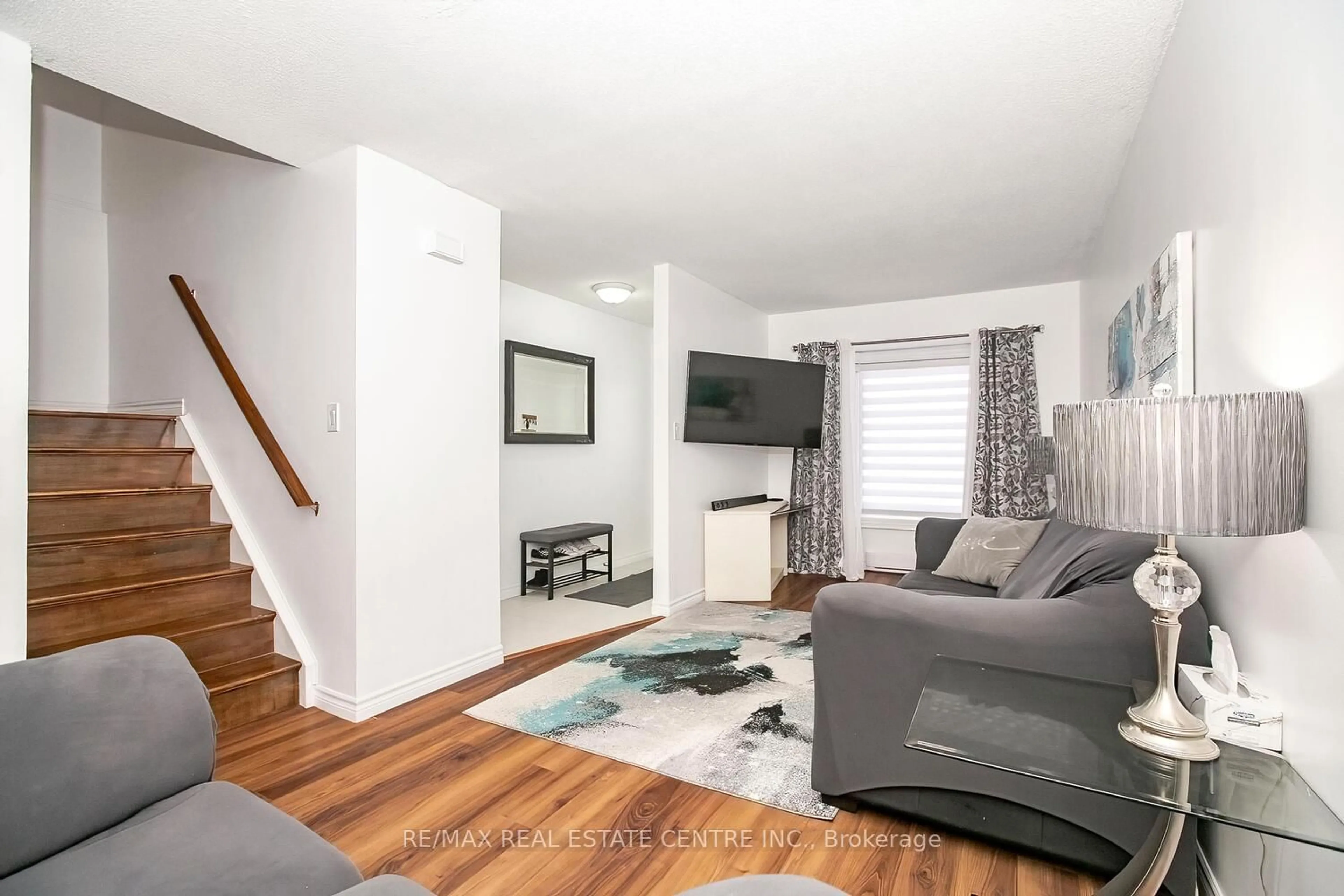 Living room with furniture, unknown for 31 Parkview Dr #27, Orangeville Ontario L9W 4H7