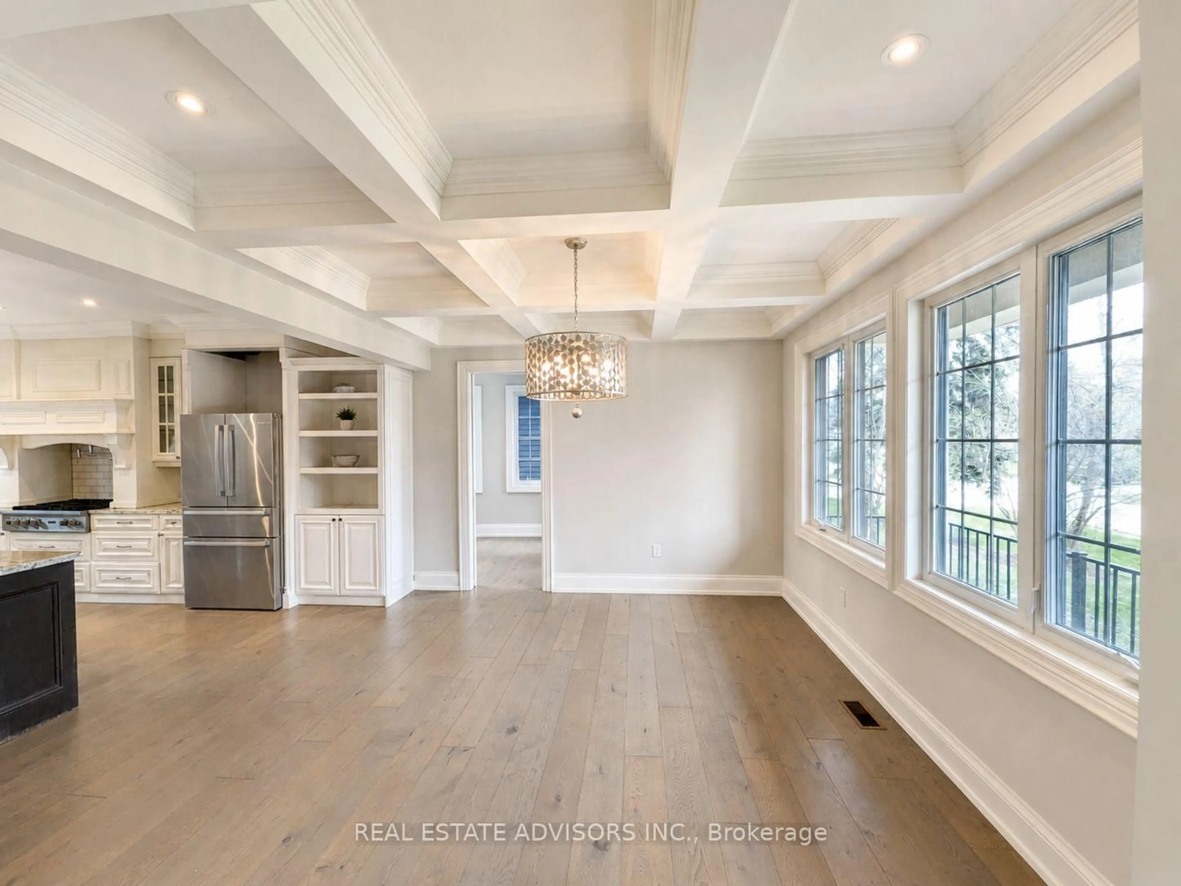 Open concept kitchen, wood/laminate floor for 428 Maplehurst Ave, Oakville Ontario L6L 4Y7