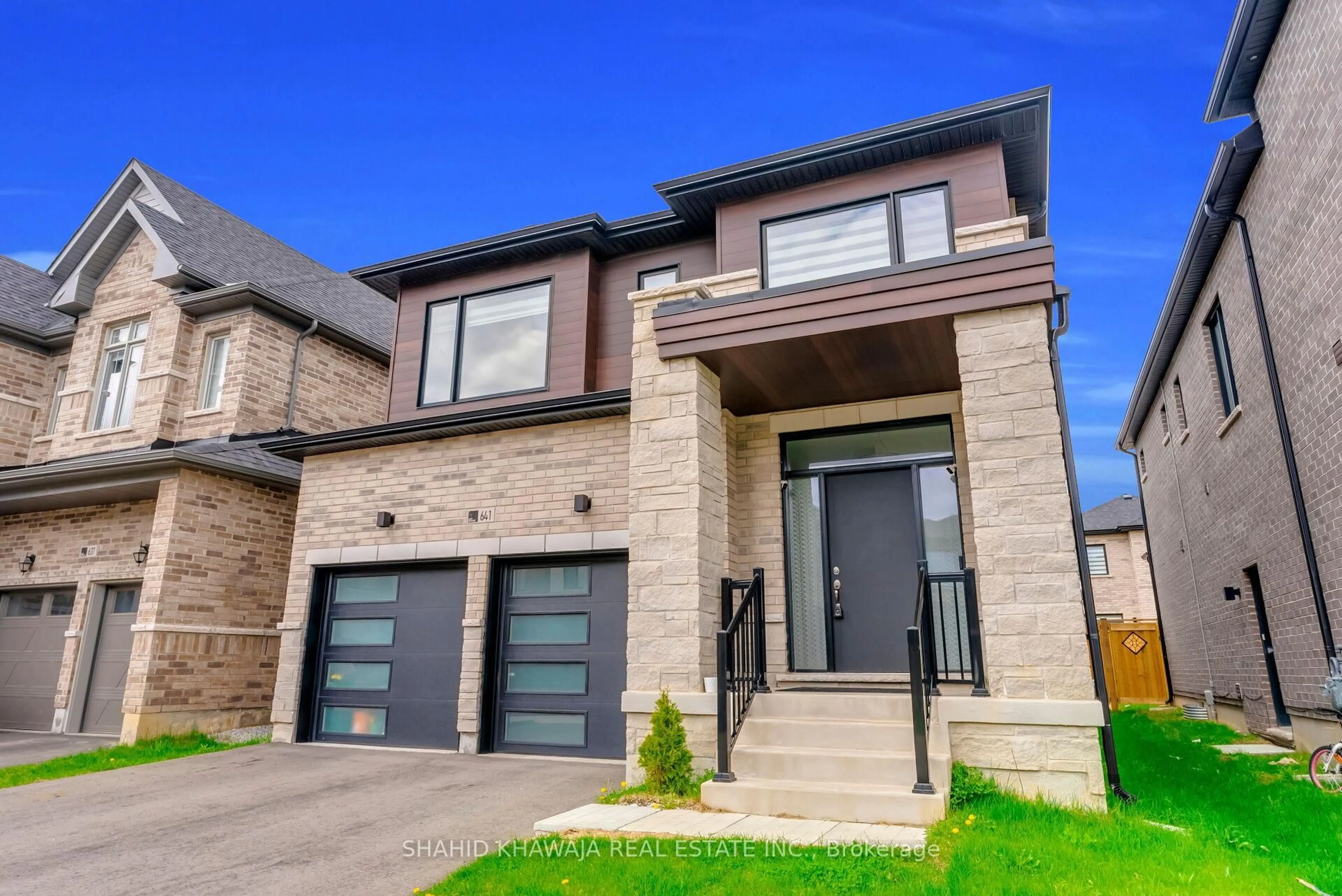 Home with brick exterior material, street for 641 Leatherleaf Landing, Milton Ontario L9E 1V3