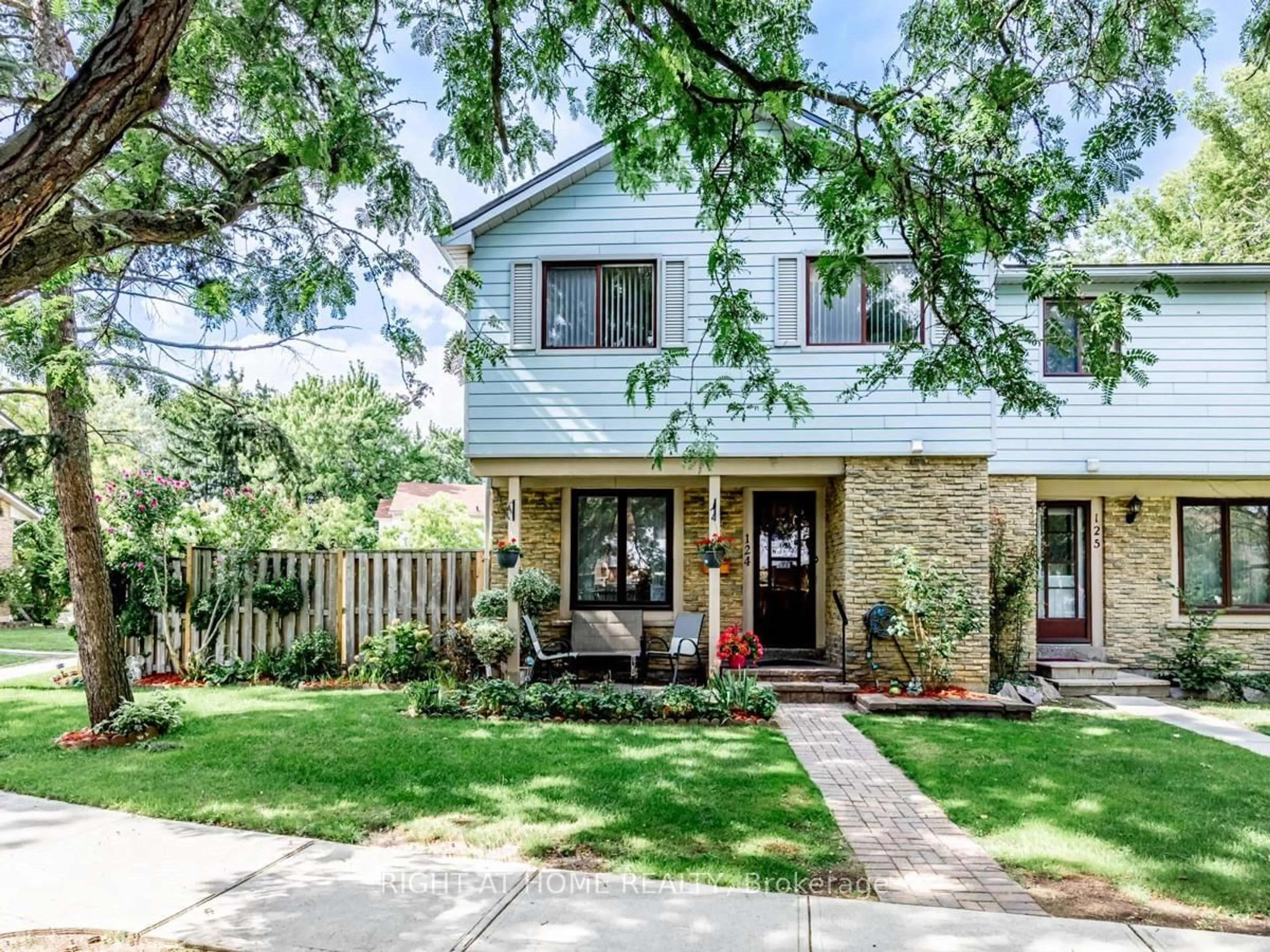 Home with brick exterior material, street for 6540 Falconer Dr #124, Mississauga Ontario L5N 1M1