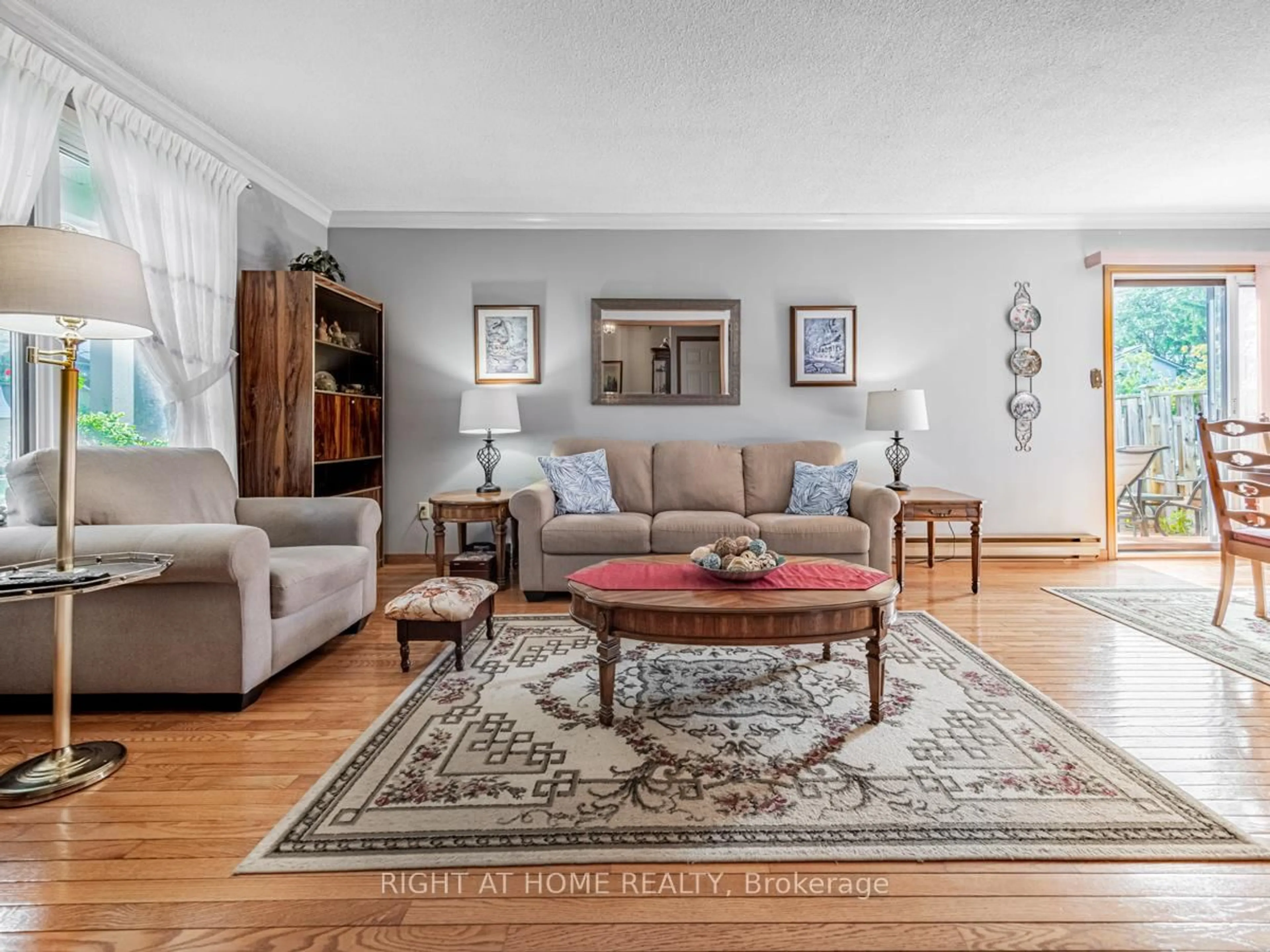 Living room with furniture, unknown for 6540 Falconer Dr #124, Mississauga Ontario L5N 1M1