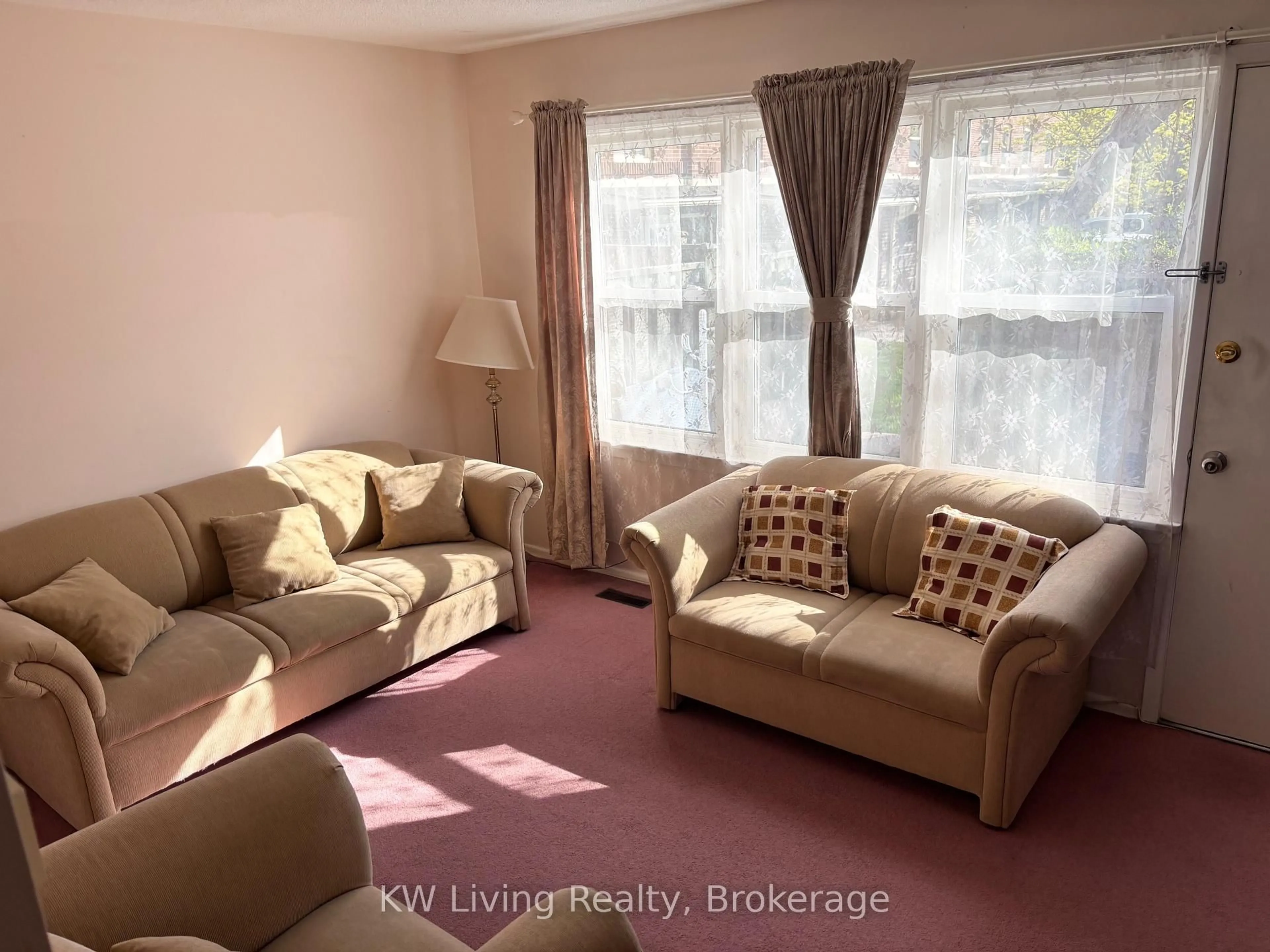 Living room with furniture, unknown for 94 Edenborough Dr, Brampton Ontario L6T 3A4