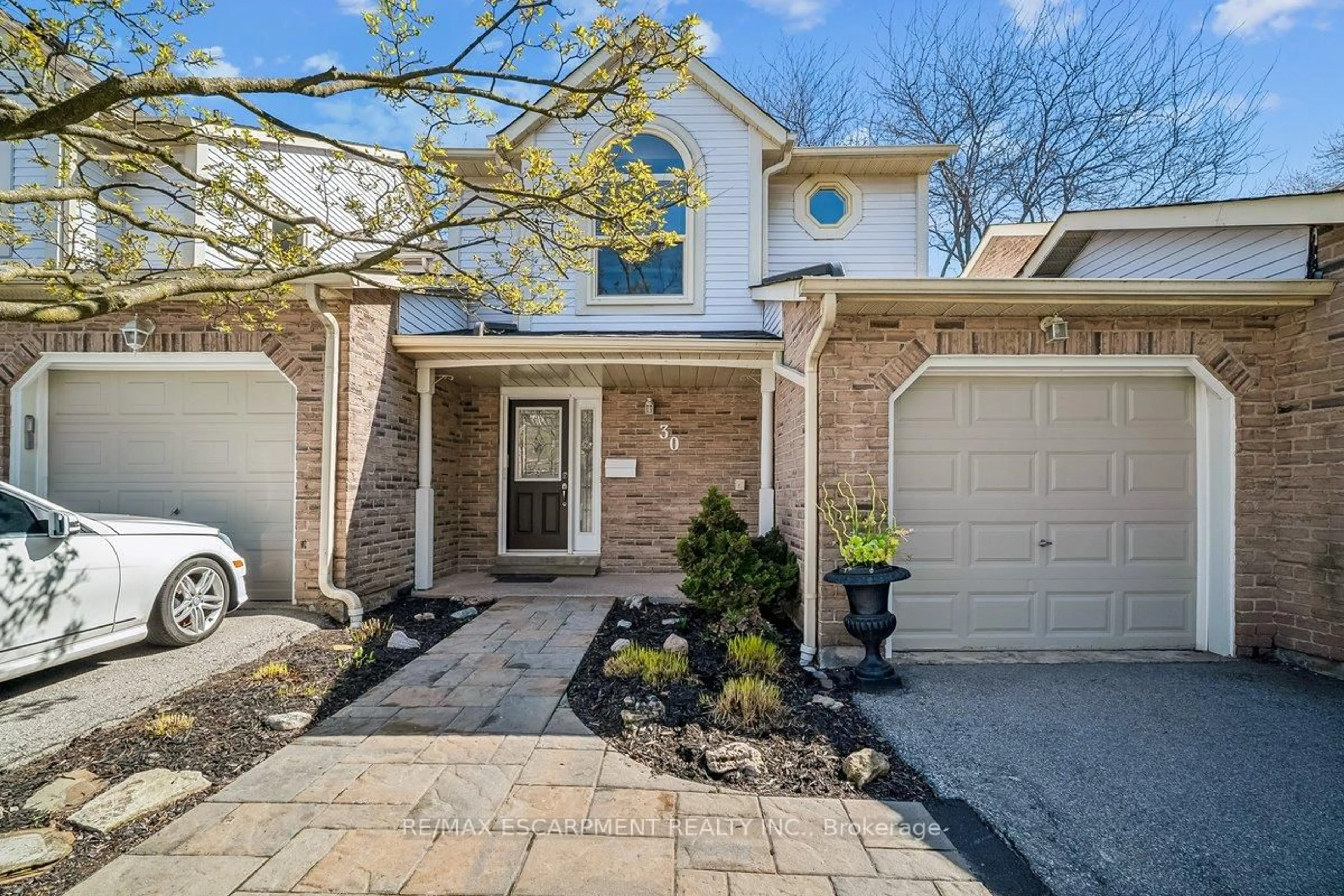 Home with brick exterior material, street for 5255 Lakeshore Rd #30, Burlington Ontario L7L 5X8