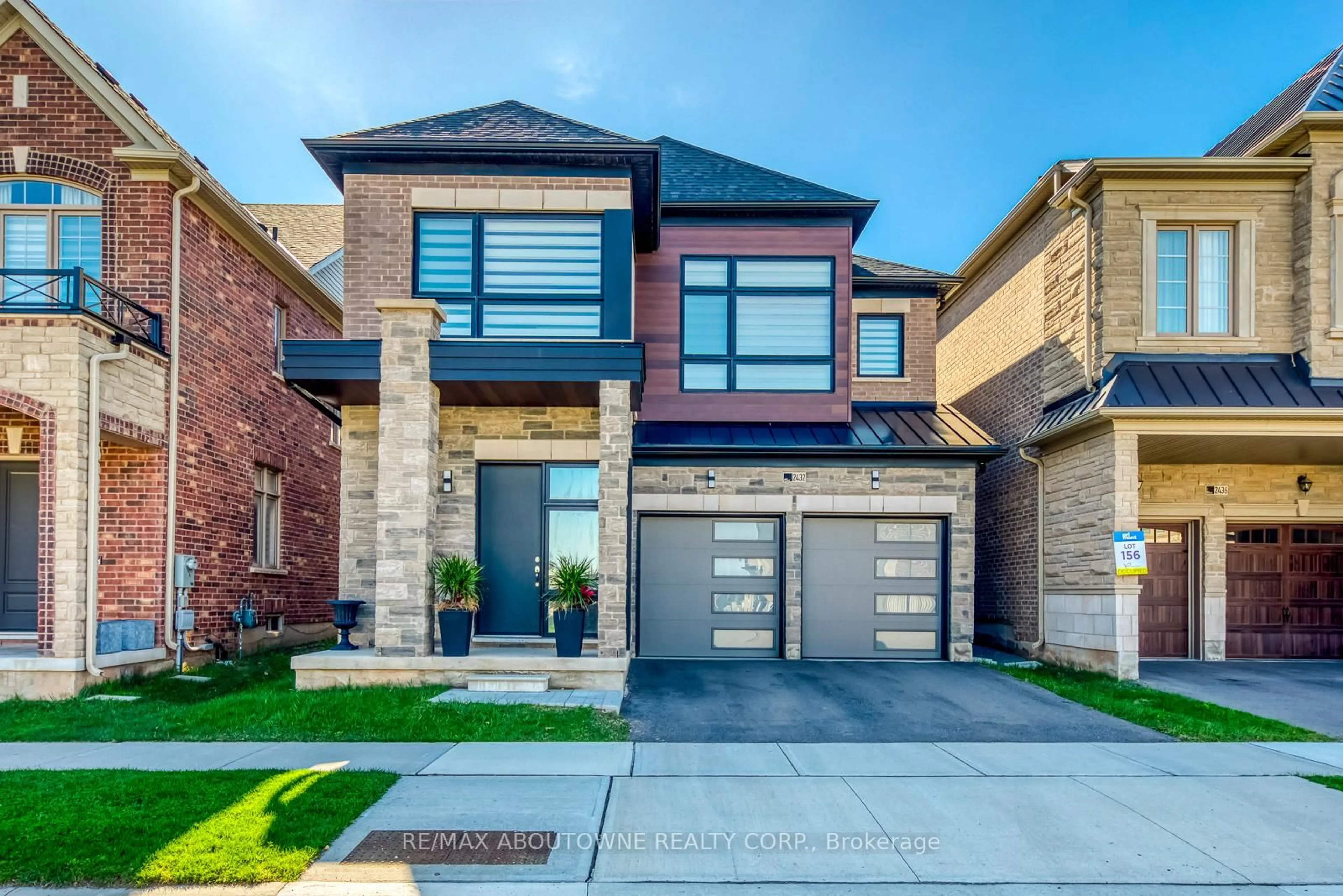 Home with brick exterior material, street for 2432 Edward Leaver Tr, Oakville Ontario L6M 5M2