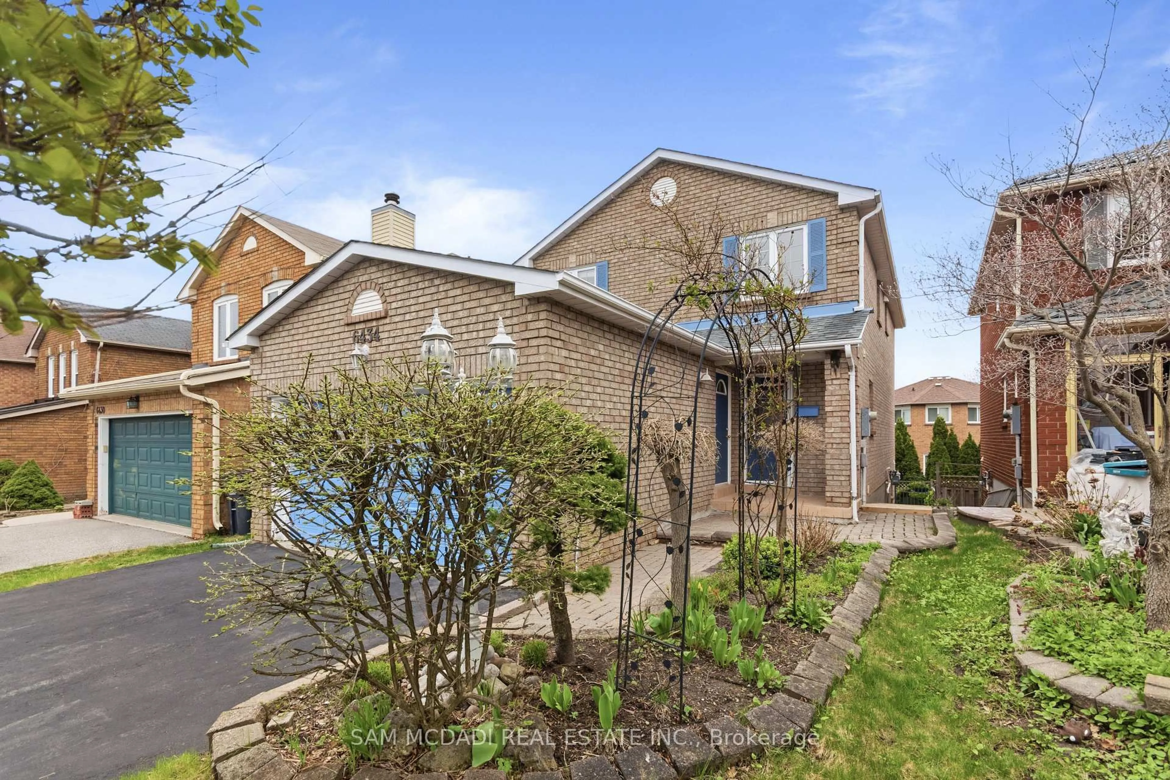 Home with brick exterior material, street for 6434 Longspur Rd, Mississauga Ontario L5N 6E4