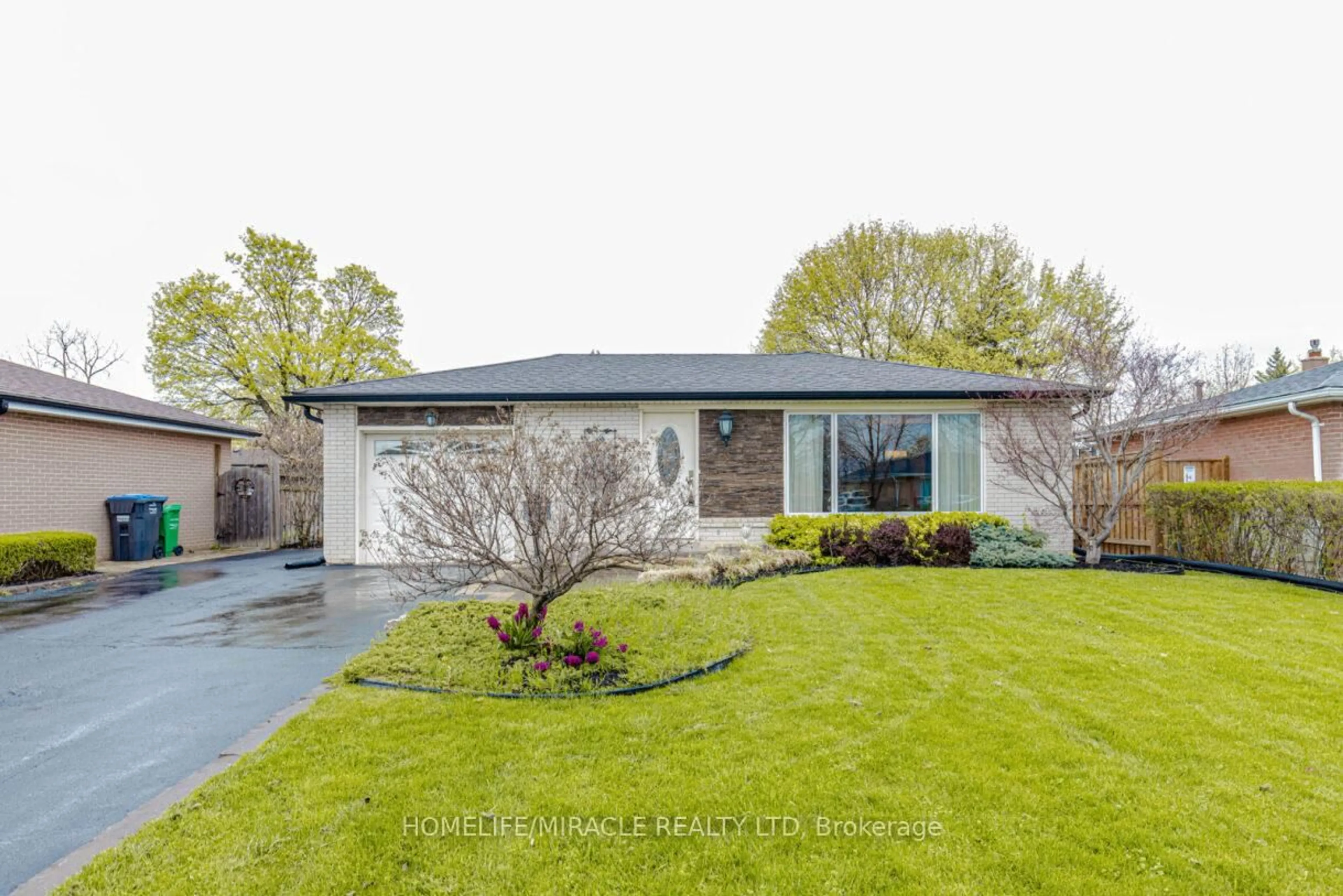 Home with vinyl exterior material, street for 22 Brentwood Dr, Brampton Ontario L6T 1P9