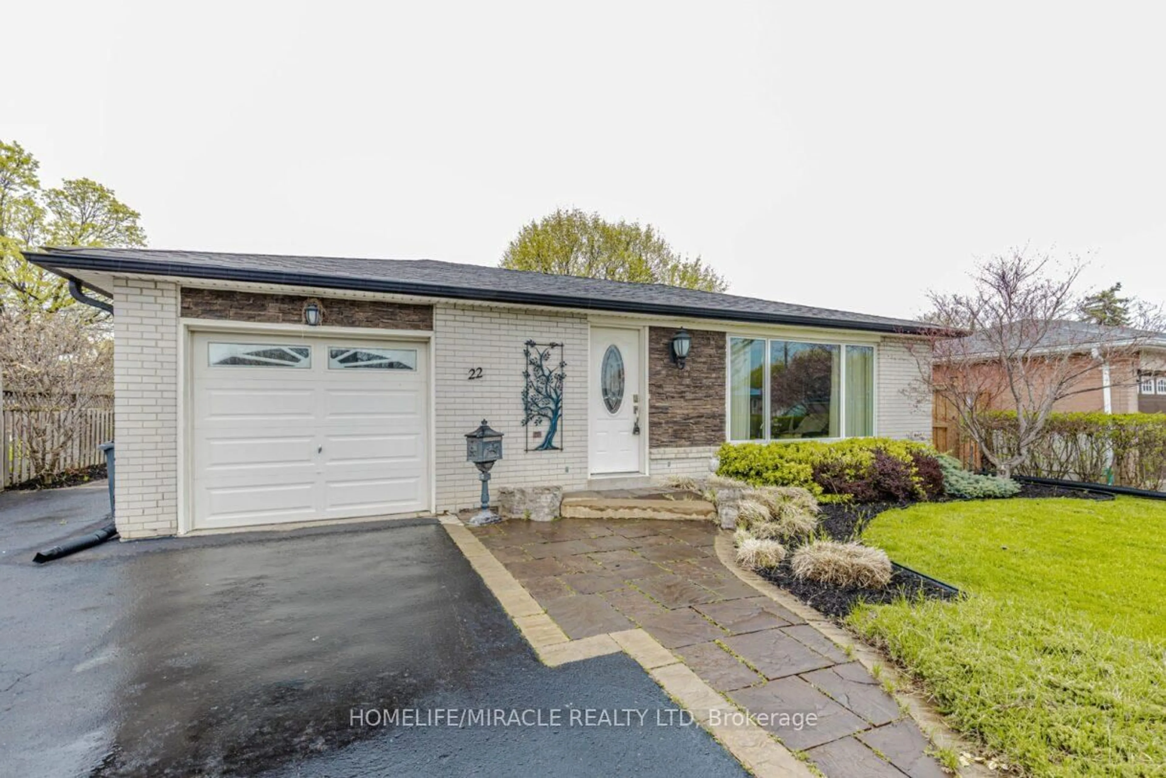 Home with brick exterior material, street for 22 Brentwood Dr, Brampton Ontario L6T 1P9
