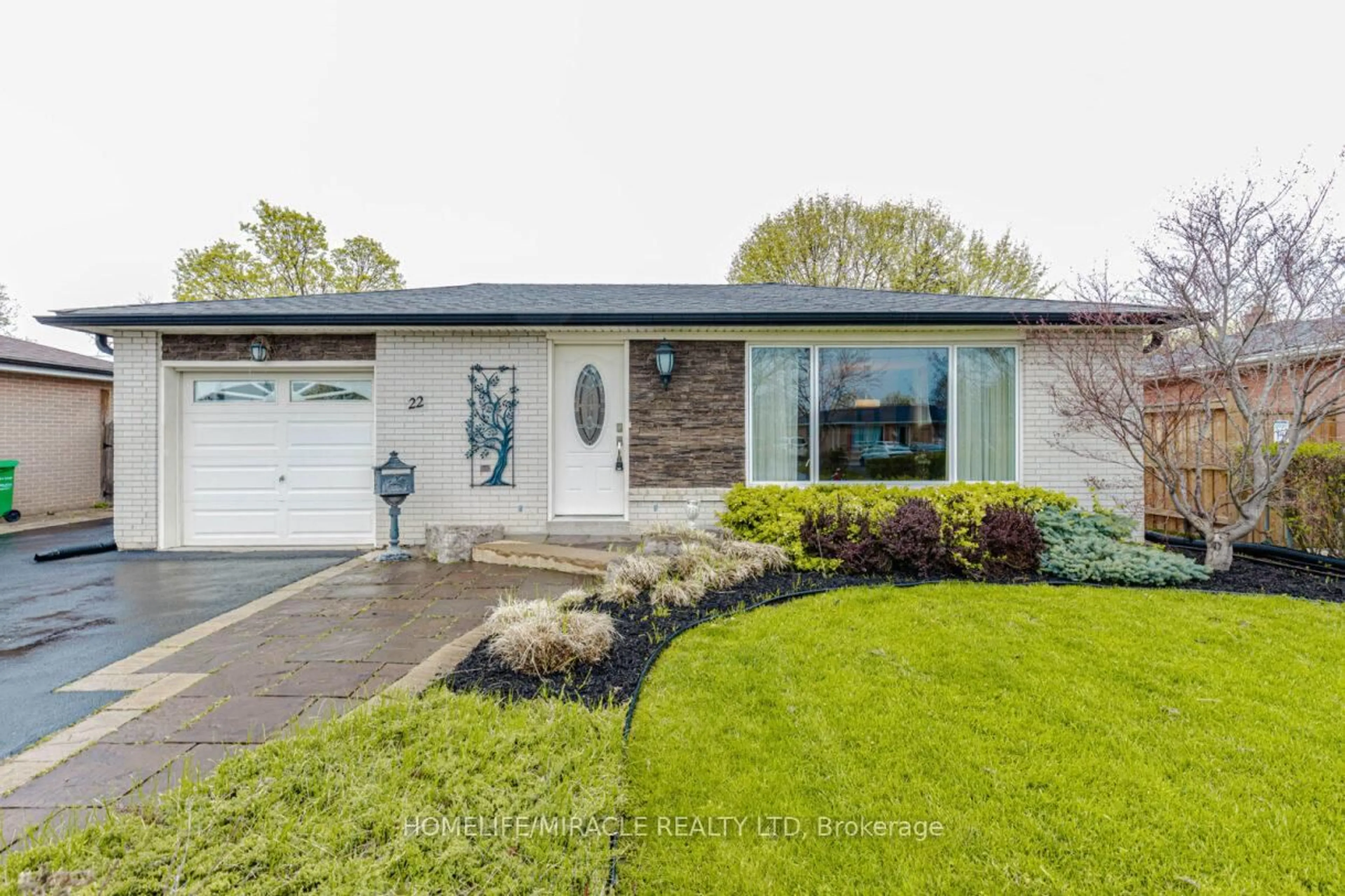Home with brick exterior material, street for 22 Brentwood Dr, Brampton Ontario L6T 1P9