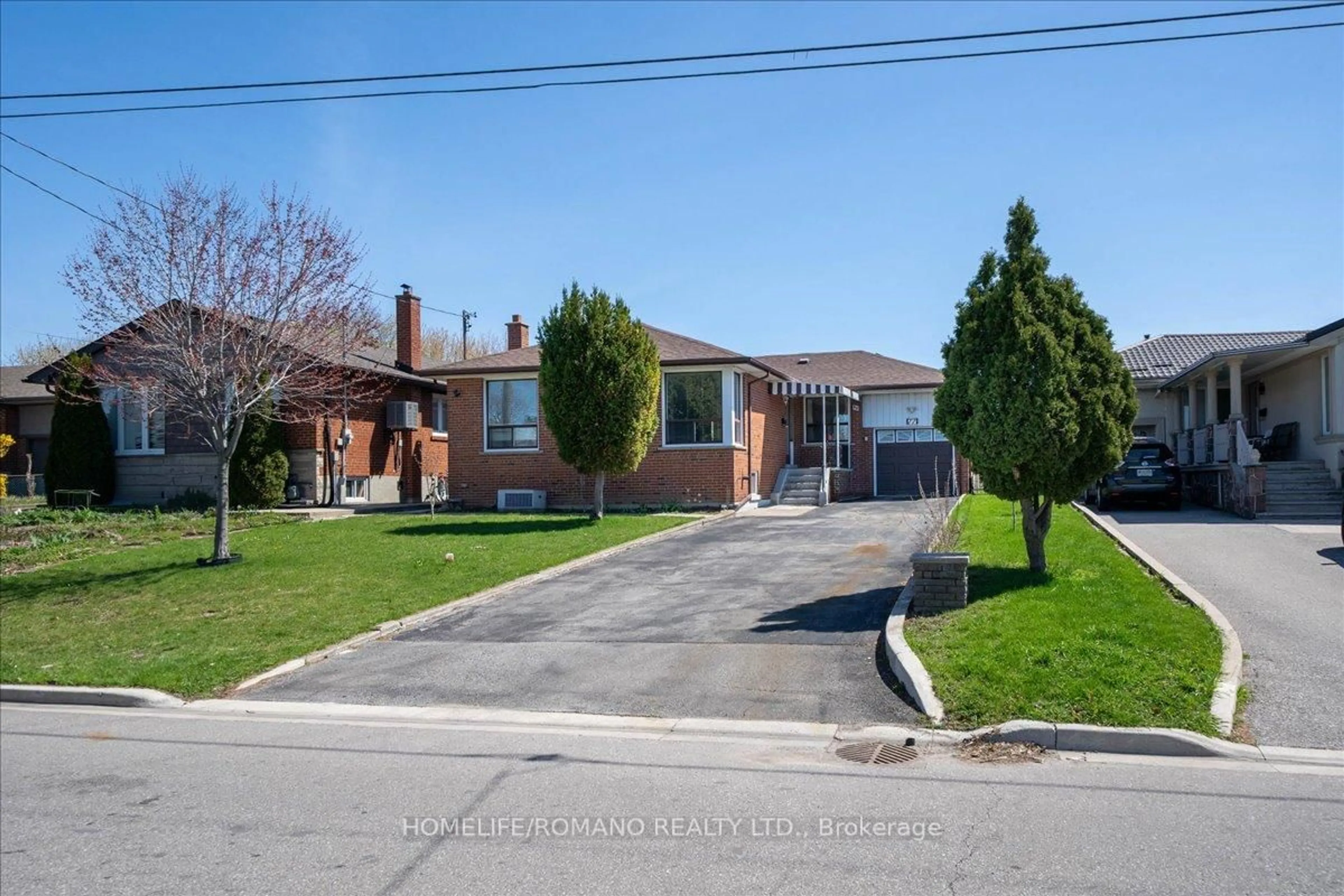 Home with brick exterior material, street for 77 Tavistock Rd, Toronto Ontario M3M 2N8