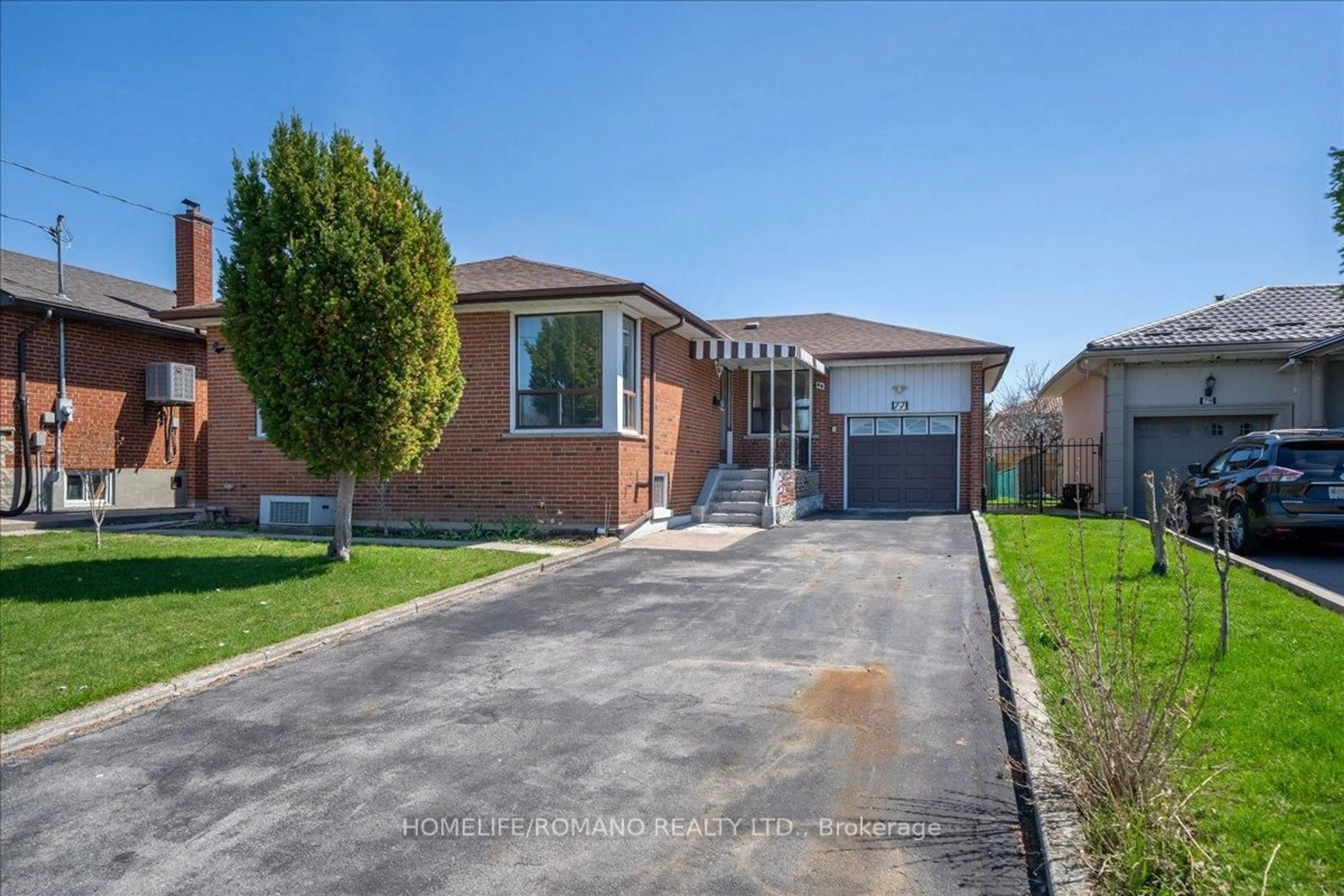 Home with brick exterior material, street for 77 Tavistock Rd, Toronto Ontario M3M 2N8