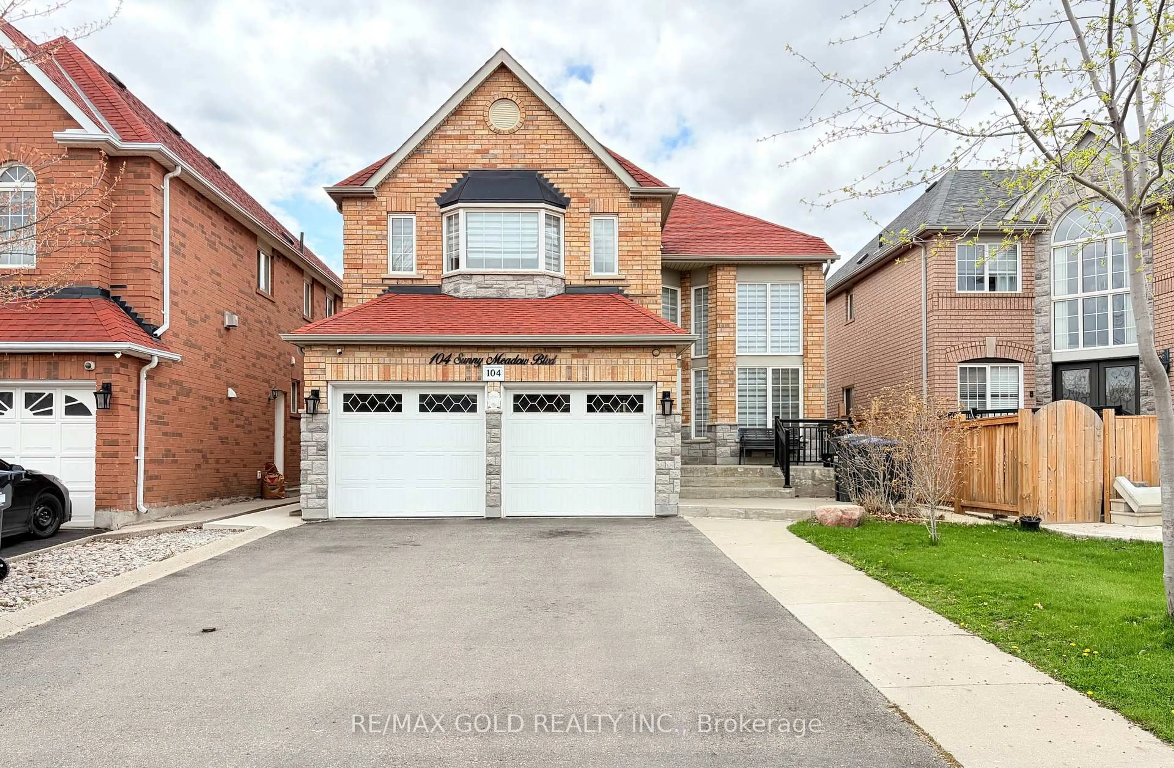 Home with brick exterior material, street for 104 Sunny Meadow Blvd, Brampton Ontario L6R 2C5