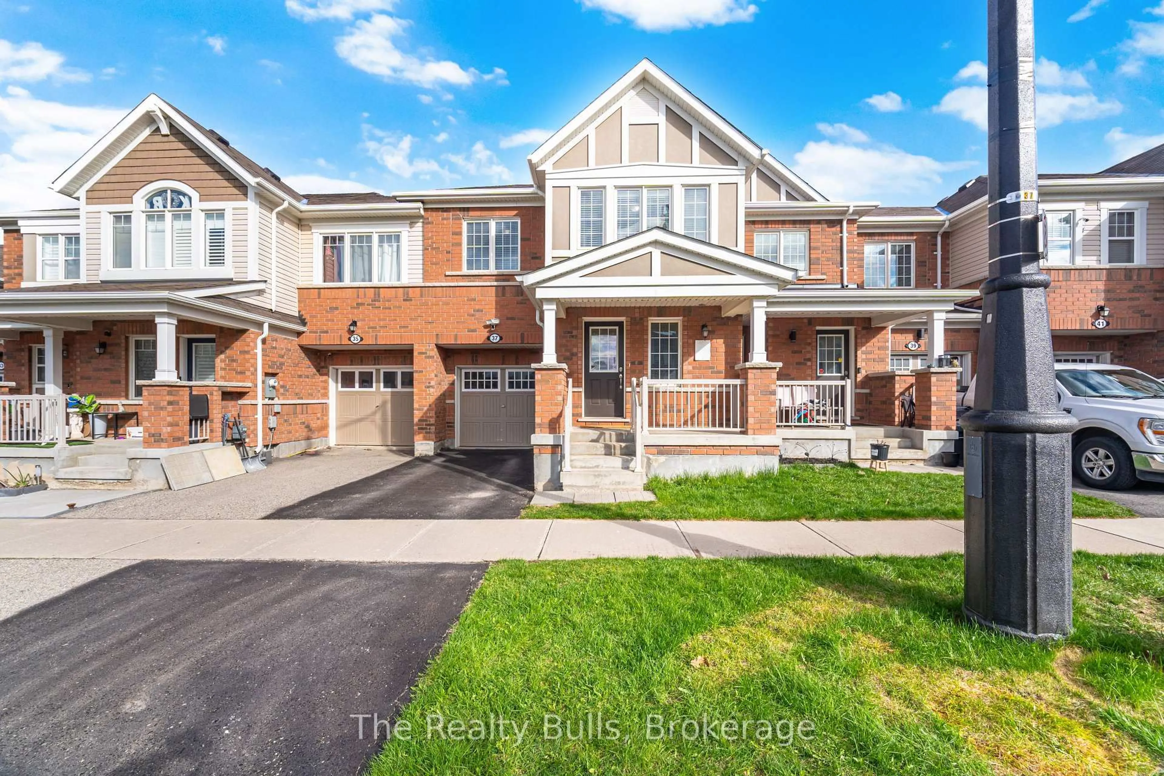 Home with brick exterior material, street for 37 Lothbury Dr, Brampton Ontario L7A 4G6