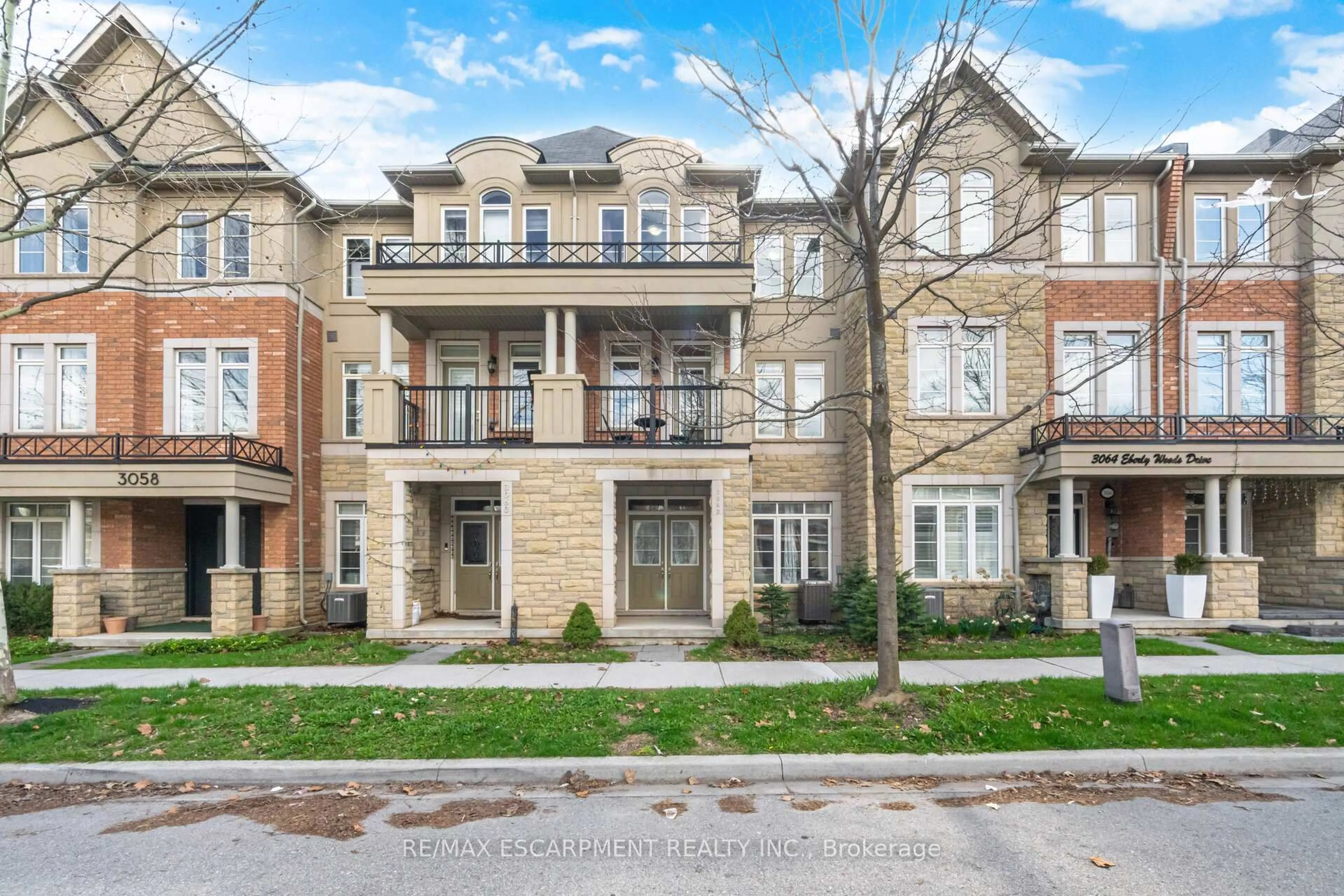 Home with brick exterior material, street for 3062 Eberly Woods Dr, Oakville Ontario L6M 0T5