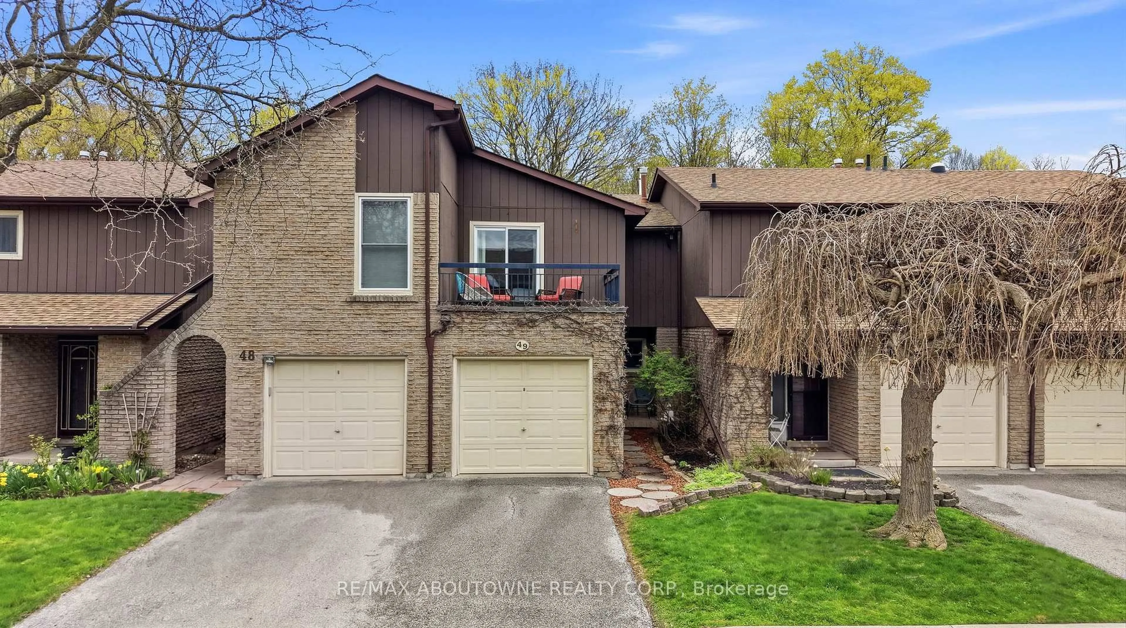 Home with brick exterior material, street for 2301 Cavendish Dr #49, Burlington Ontario L7P 3M3