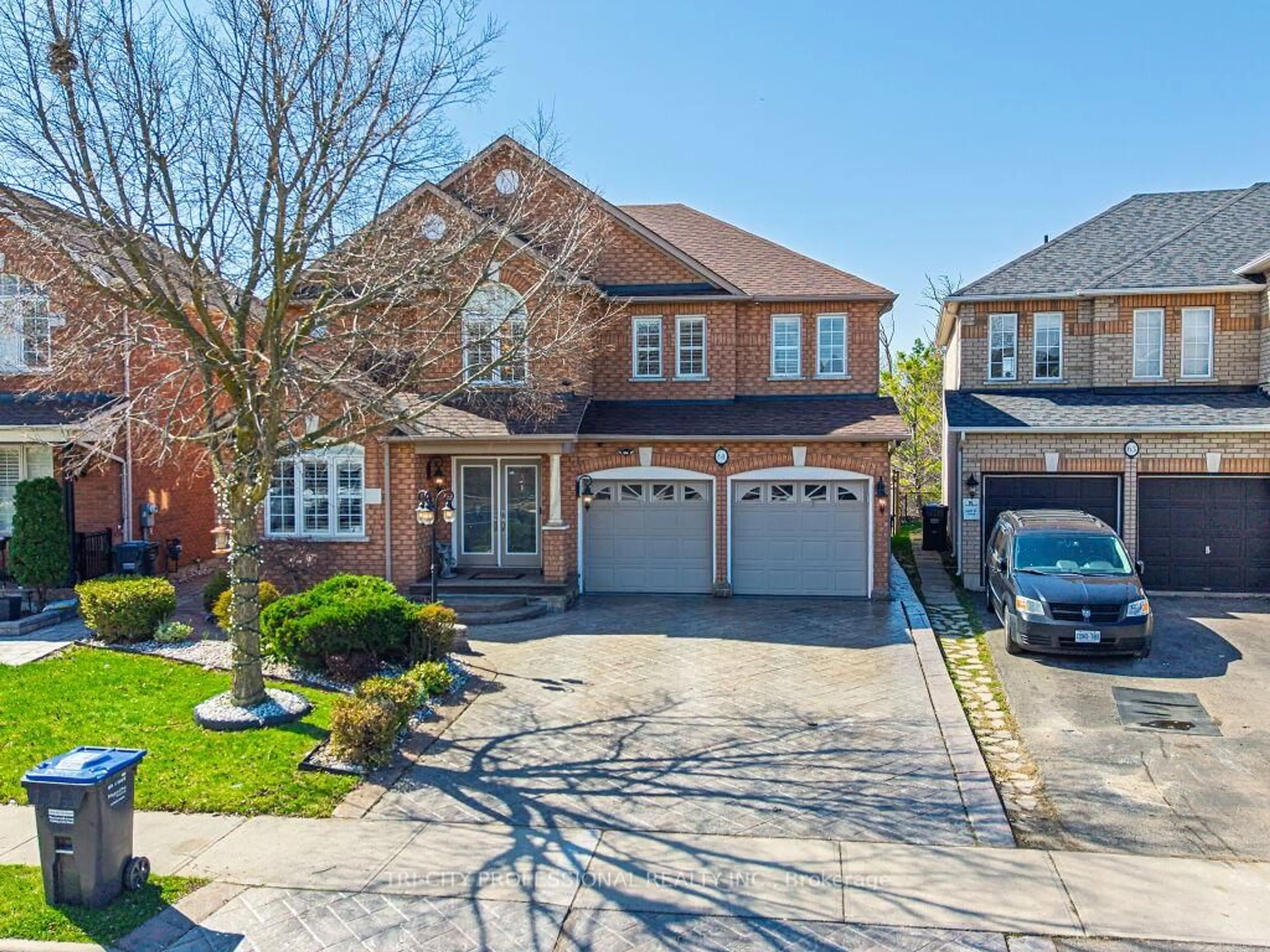 Home with brick exterior material, street for 61 Woodvalley Dr, Brampton Ontario L7A 1Z3