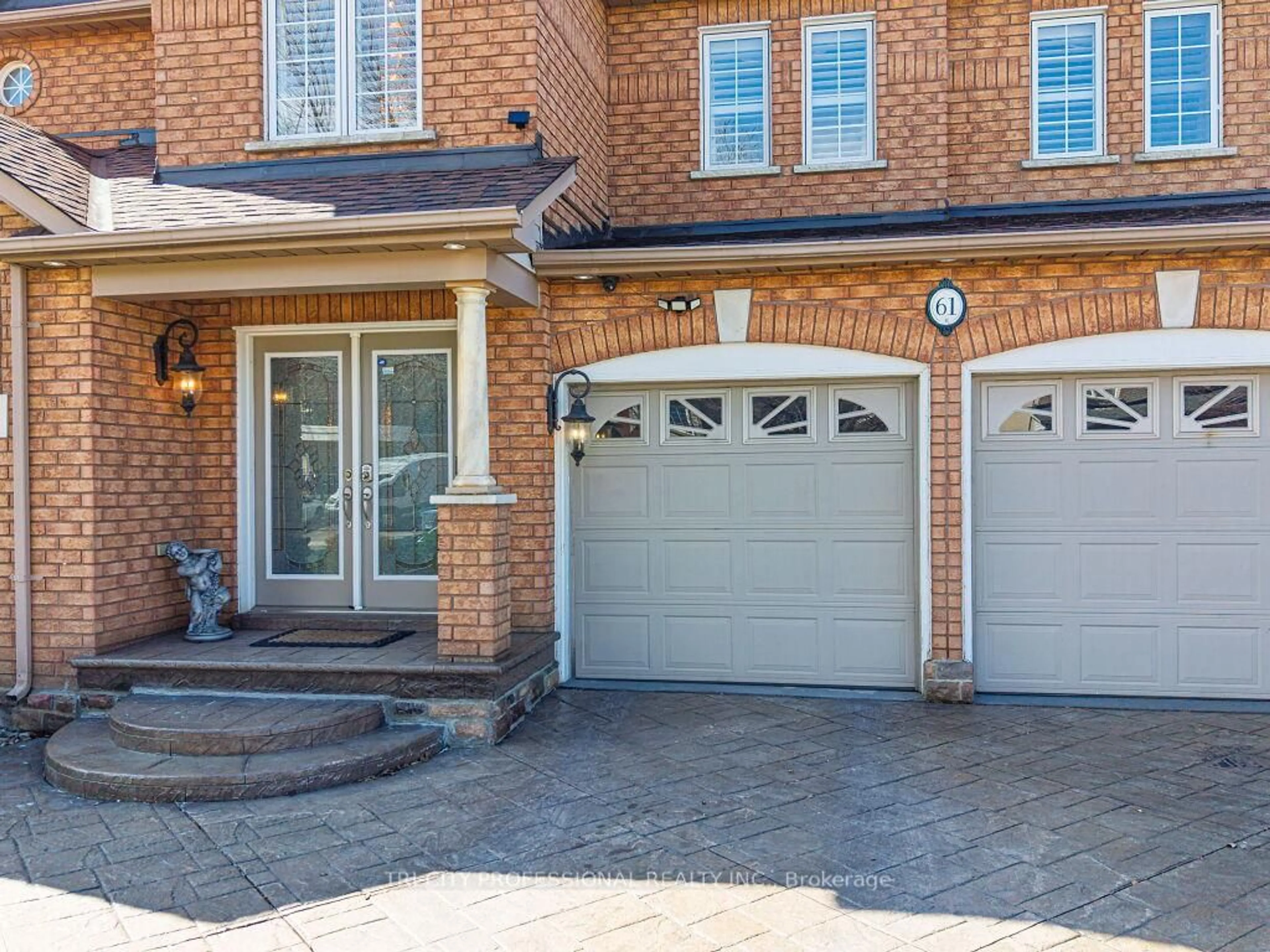 Home with brick exterior material, street for 61 Woodvalley Dr, Brampton Ontario L7A 1Z3
