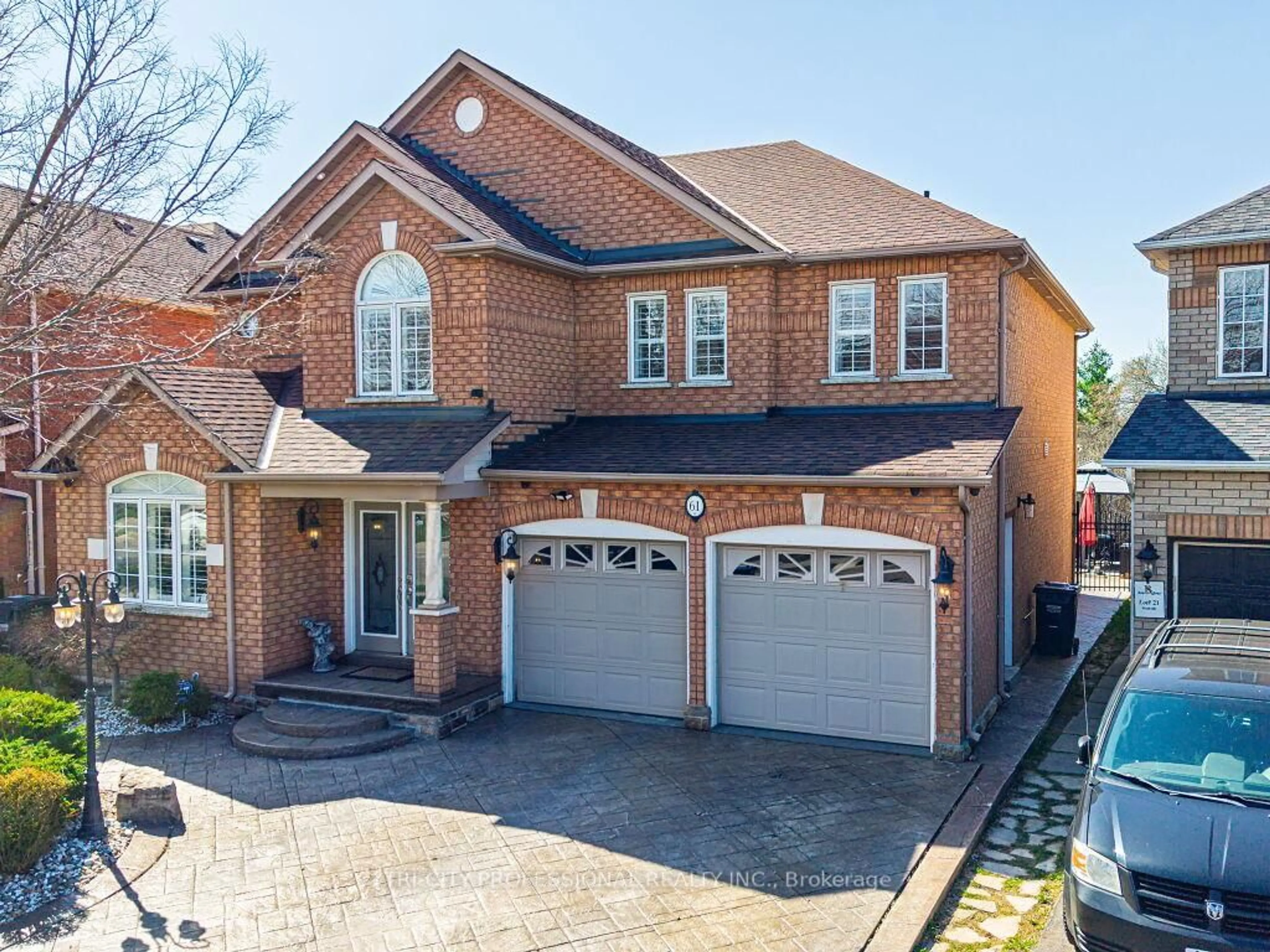 Home with brick exterior material, street for 61 Woodvalley Dr, Brampton Ontario L7A 1Z3