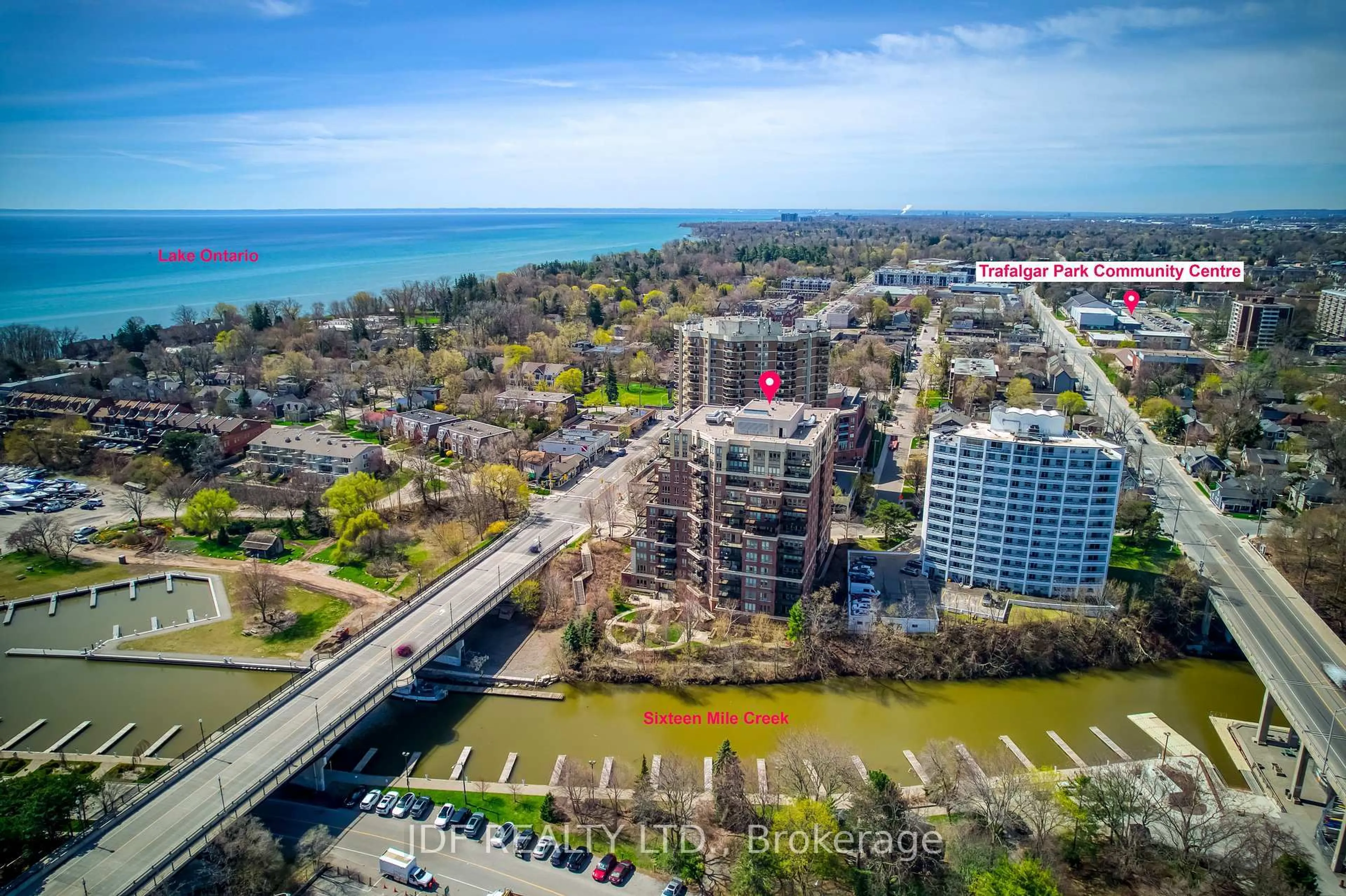 A pic from outside/outdoor area/front of a property/back of a property/a pic from drone, water/lake/river/ocean view for 111 Forsythe St #402, Oakville Ontario L6K 3J9