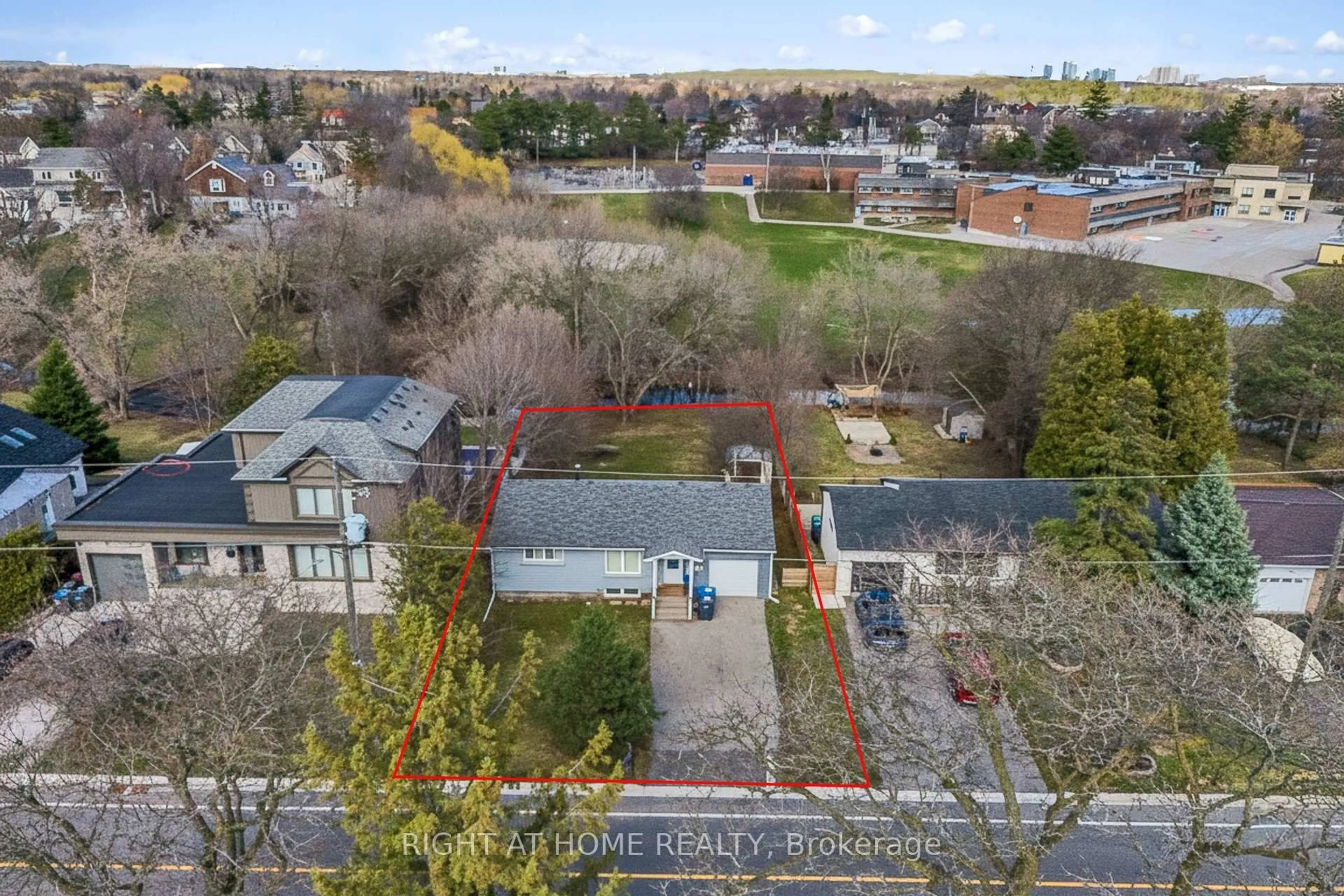 A pic from outside/outdoor area/front of a property/back of a property/a pic from drone, city buildings view from balcony for 15 Pioneer Dr, Mississauga Ontario L5M 1G8
