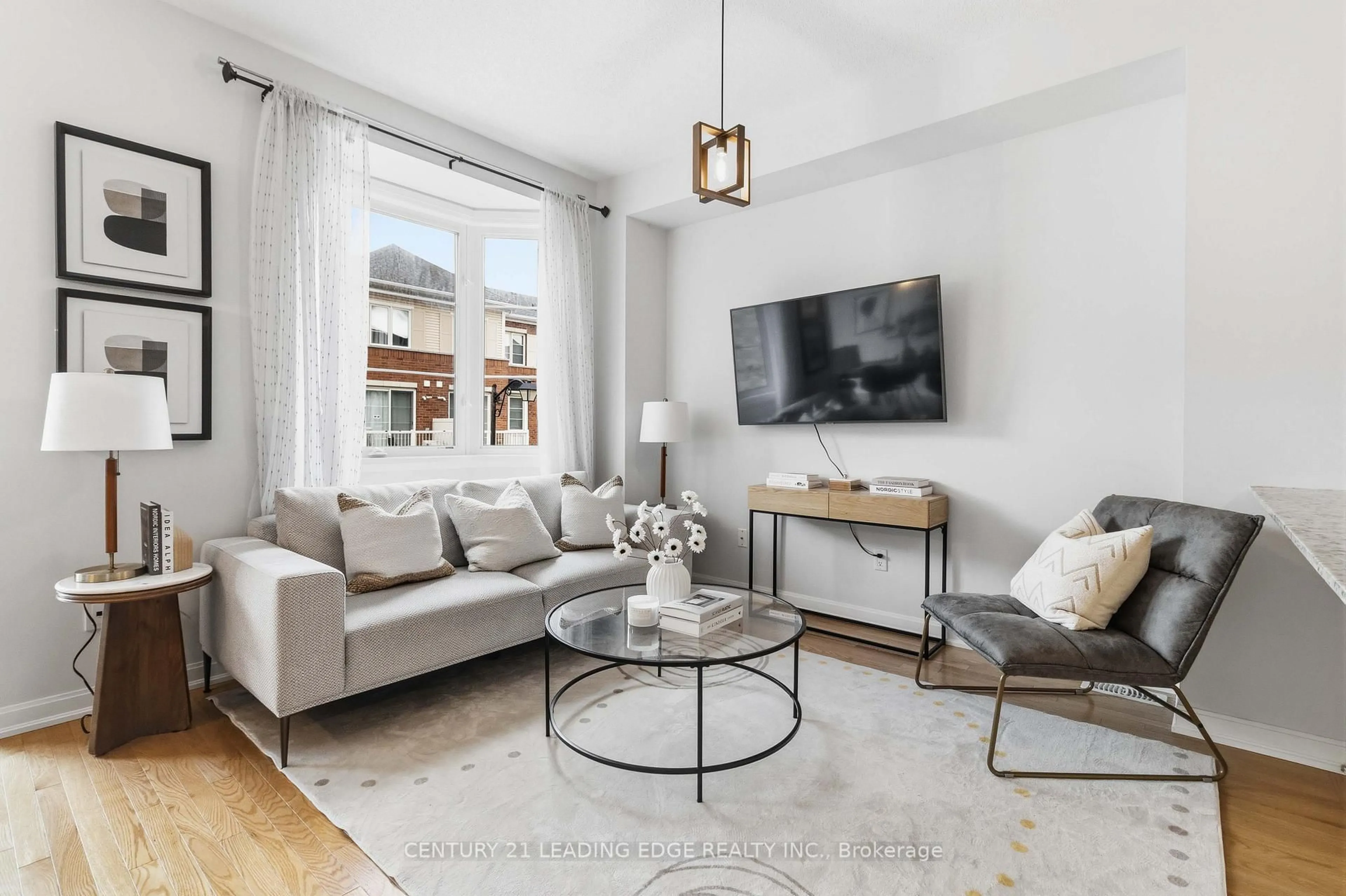Living room with furniture, unknown for 165 Hampshire Way #106, Milton Ontario L9T 8M7