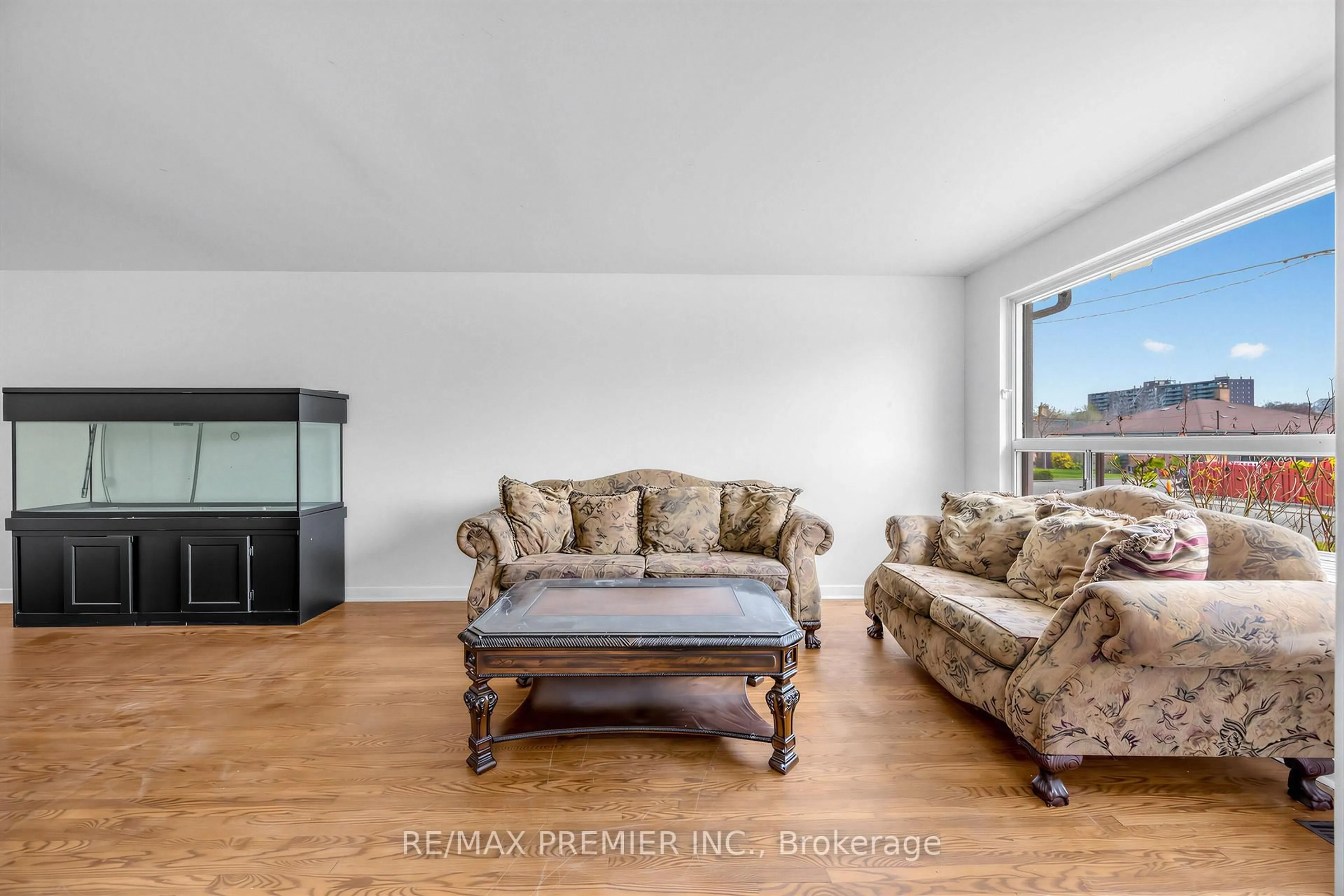 Living room with furniture, wood/laminate floor for 126 Langden Ave, Toronto Ontario M6N 2L5