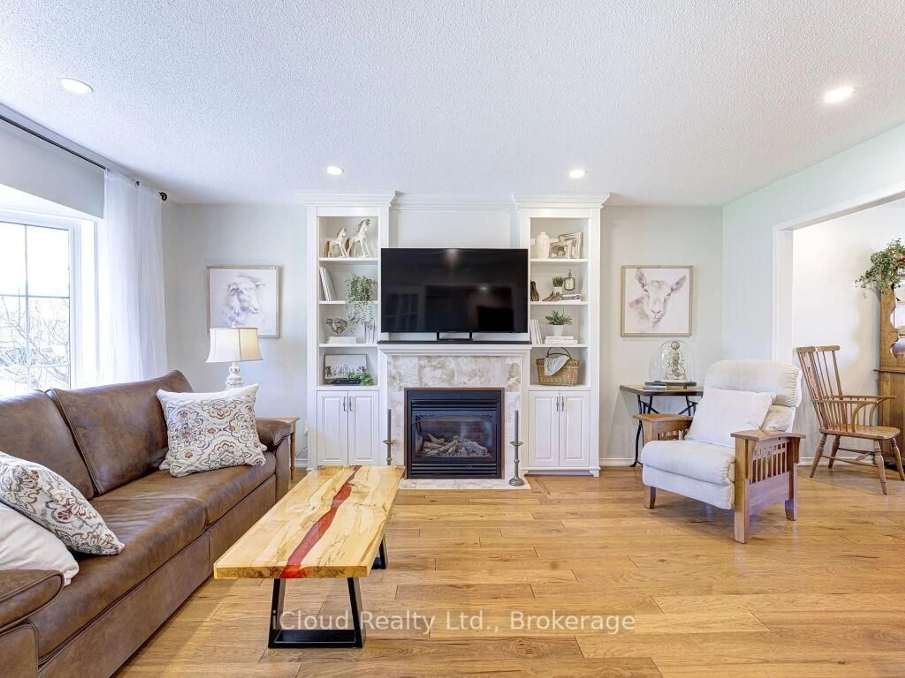 Living room with furniture, wood/laminate floor for 11012 Amos Dr, Milton Ontario L0P 1B0