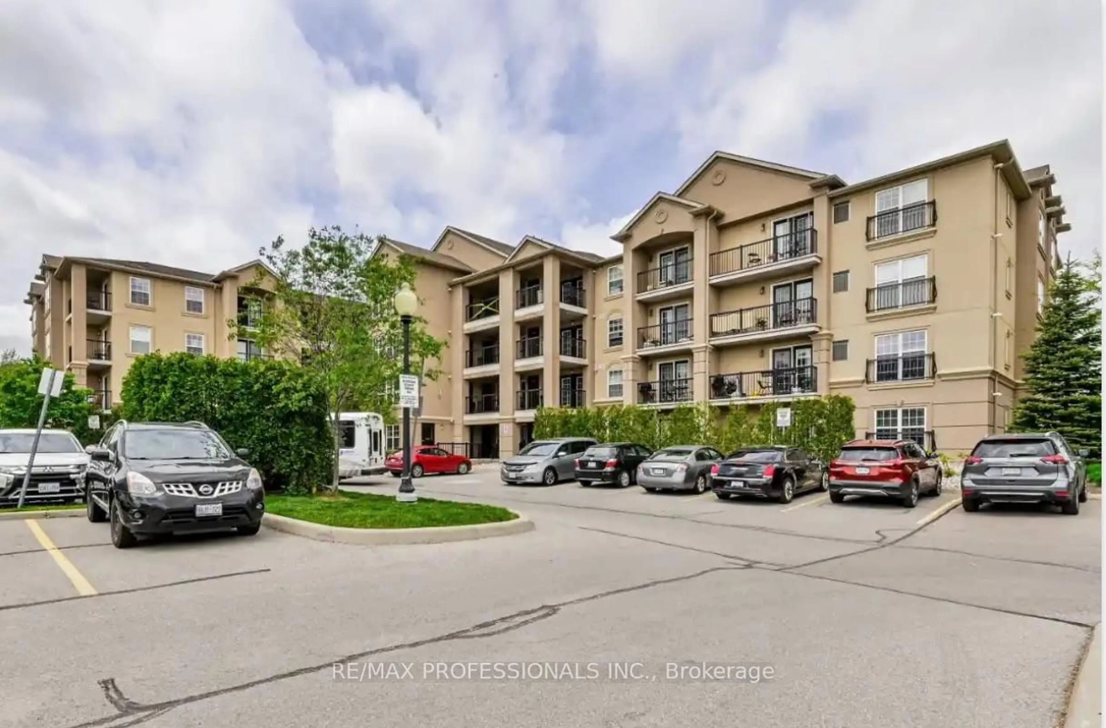A pic from outside/outdoor area/front of a property/back of a property/a pic from drone, unknown for 1390 Main St #107, Milton Ontario L9T 7S9