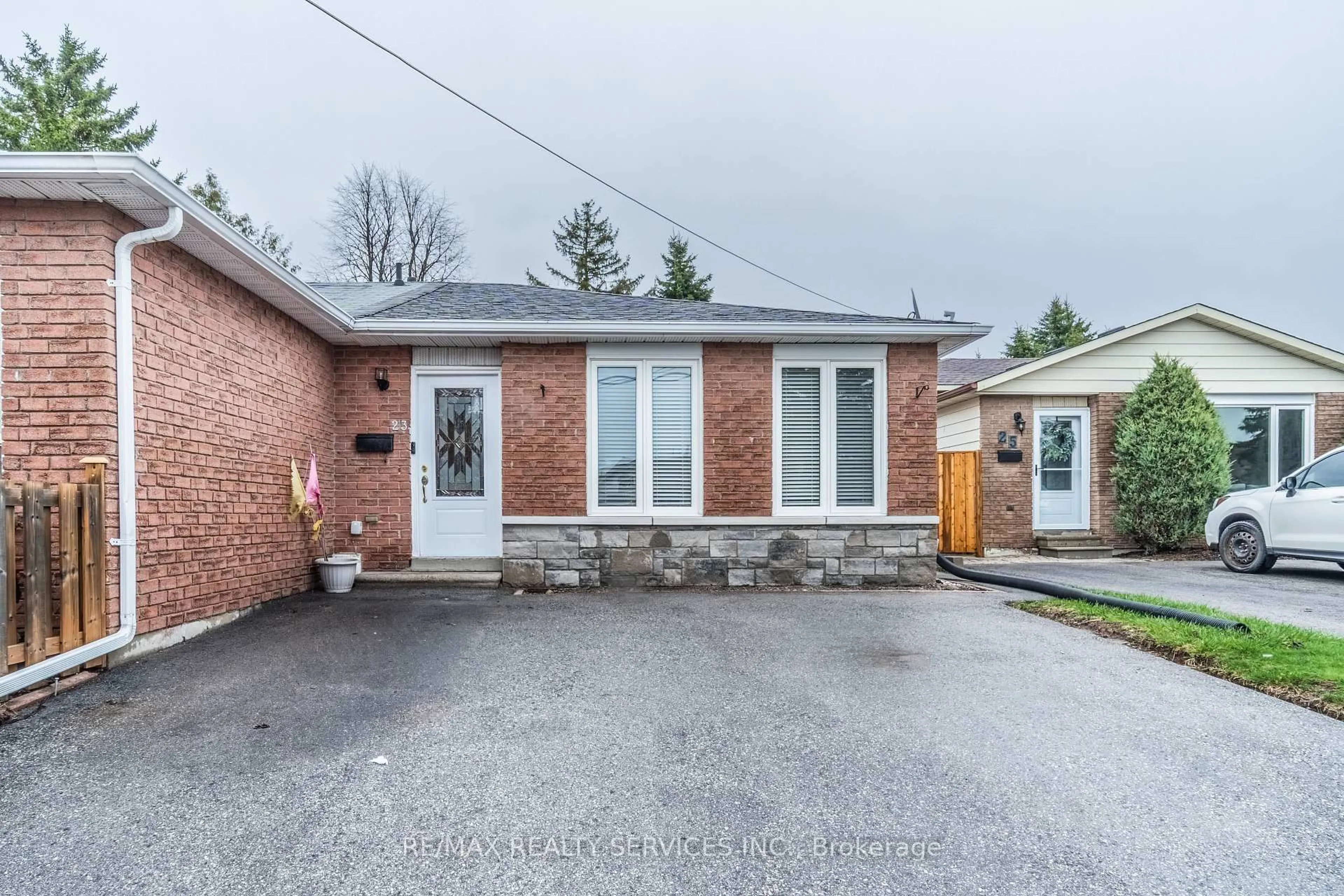 Home with brick exterior material, street for 23 Dawson Rd, Orangeville Ontario L9W 3T9