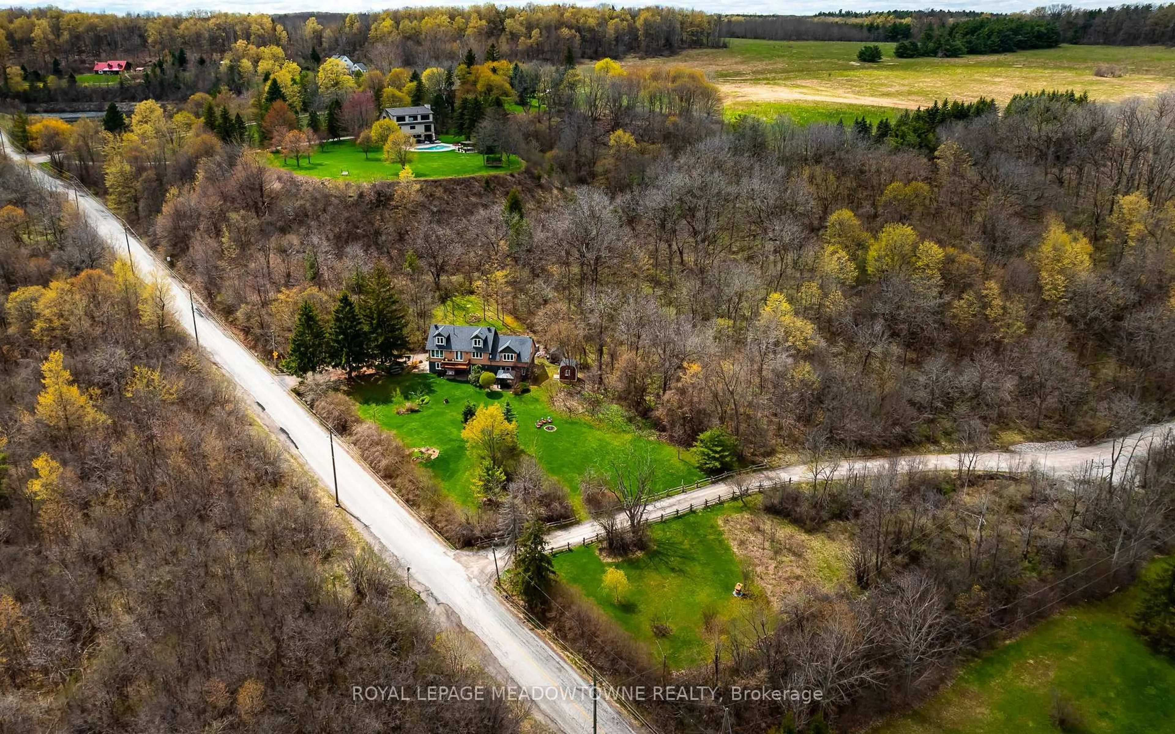 A pic from outside/outdoor area/front of a property/back of a property/a pic from drone, forest/trees view for 15585 Clayhill Rd, Halton Hills Ontario L7G 4S8