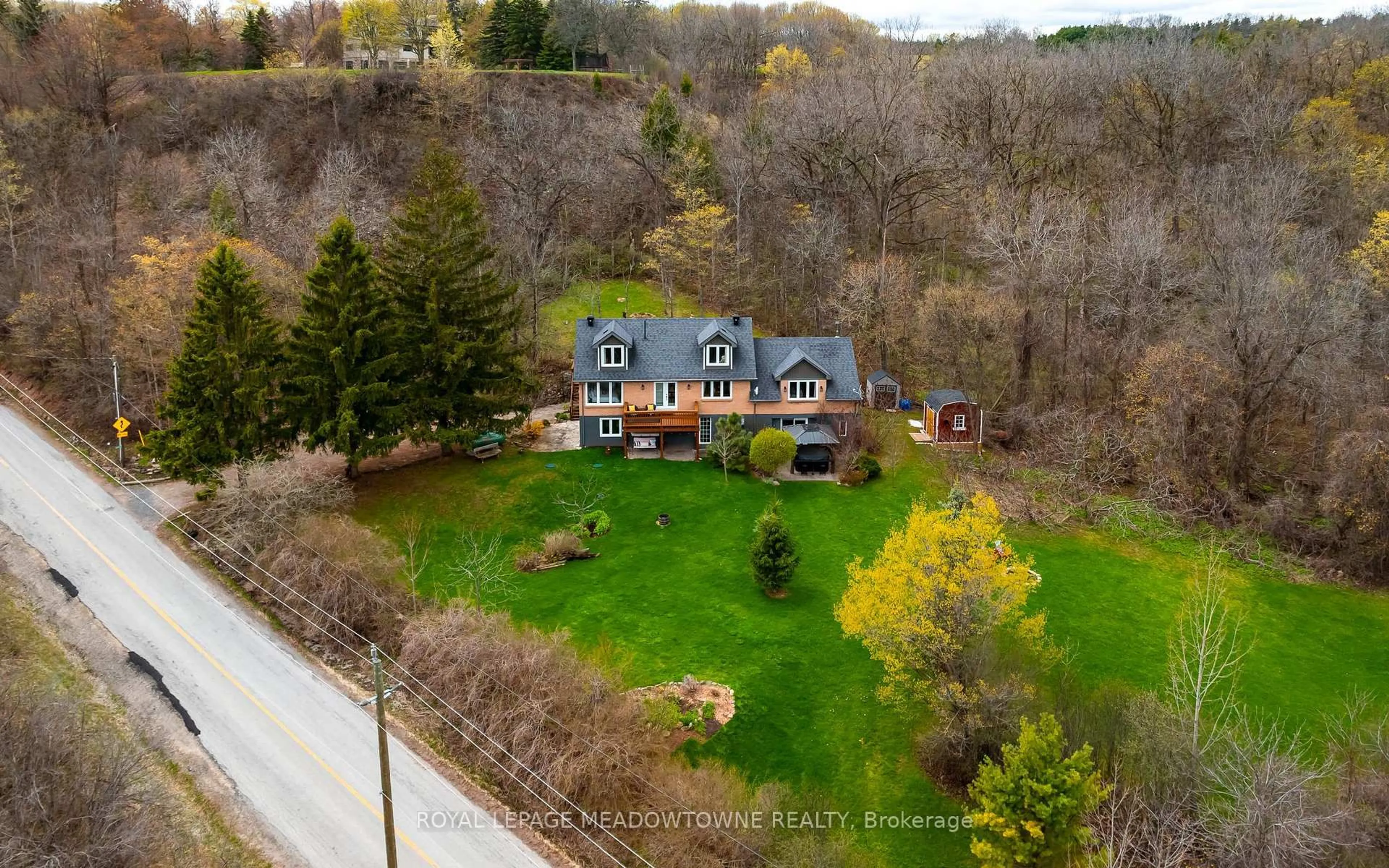 A pic from outside/outdoor area/front of a property/back of a property/a pic from drone, unknown for 15585 Clayhill Rd, Halton Hills Ontario L7G 4S8