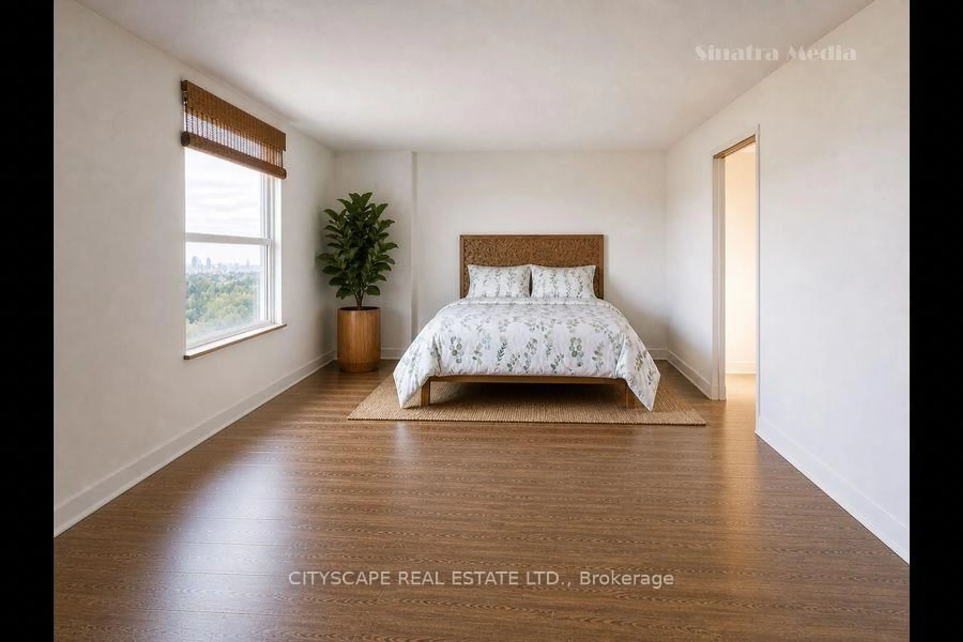 Bedroom with bed, wood/laminate floor for 49 Queen St #1004, Mississauga Ontario L5G 4N6
