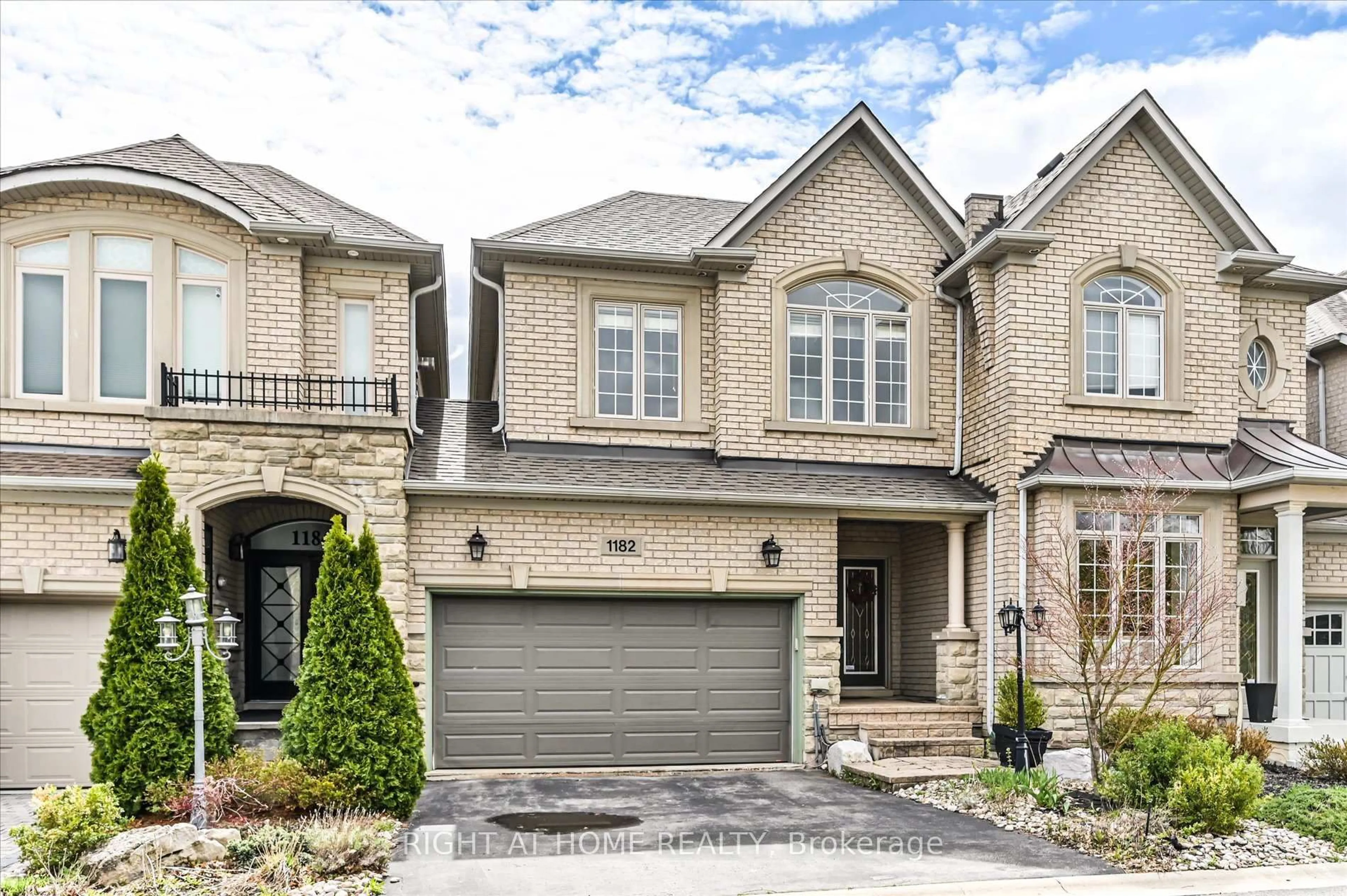 Home with brick exterior material, street for 1182 Woodington Lane, Oakville Ontario L6H 7V1